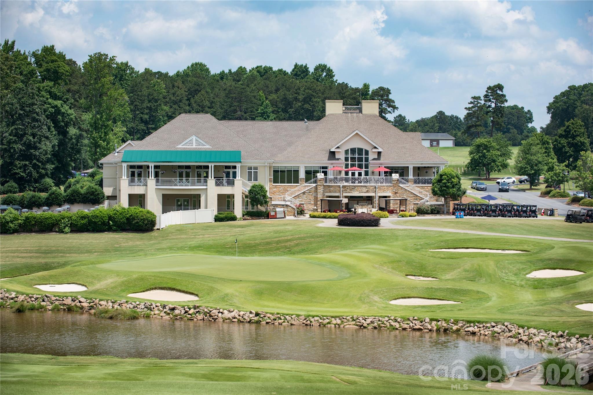 Northstone Club is a private club that offers an award-winning golf course, 7 tennis courts, 4 pickleball courts, 4 swimming pools, fitness center, restaurant, and clubhouse. - 12822 Cadgwith Cove Drive, Huntersville
