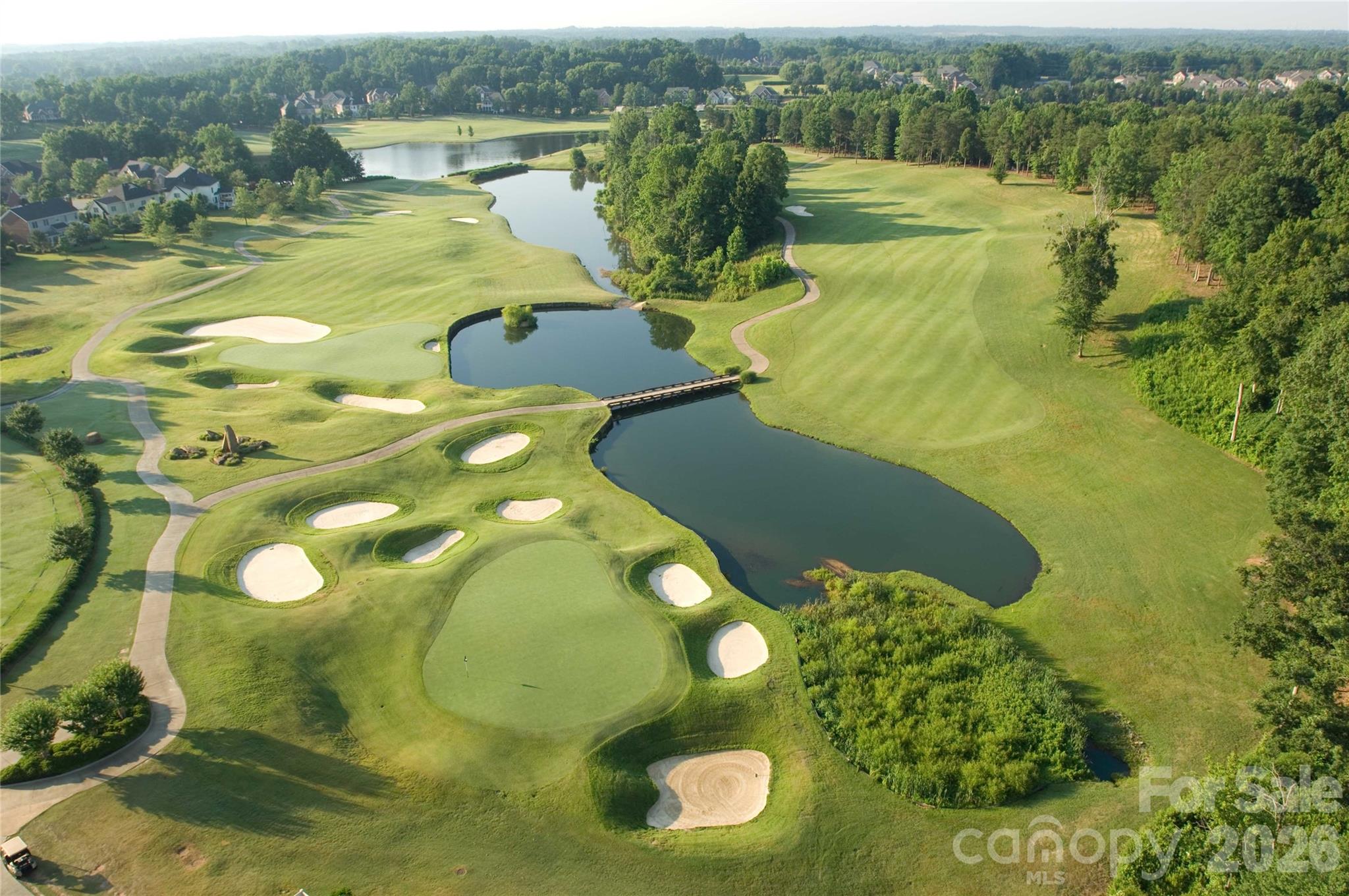 Aerial view of 9th and 18th holes of the award winning PB Dye golf course. - 12822 Cadgwith Cove Drive, Huntersville