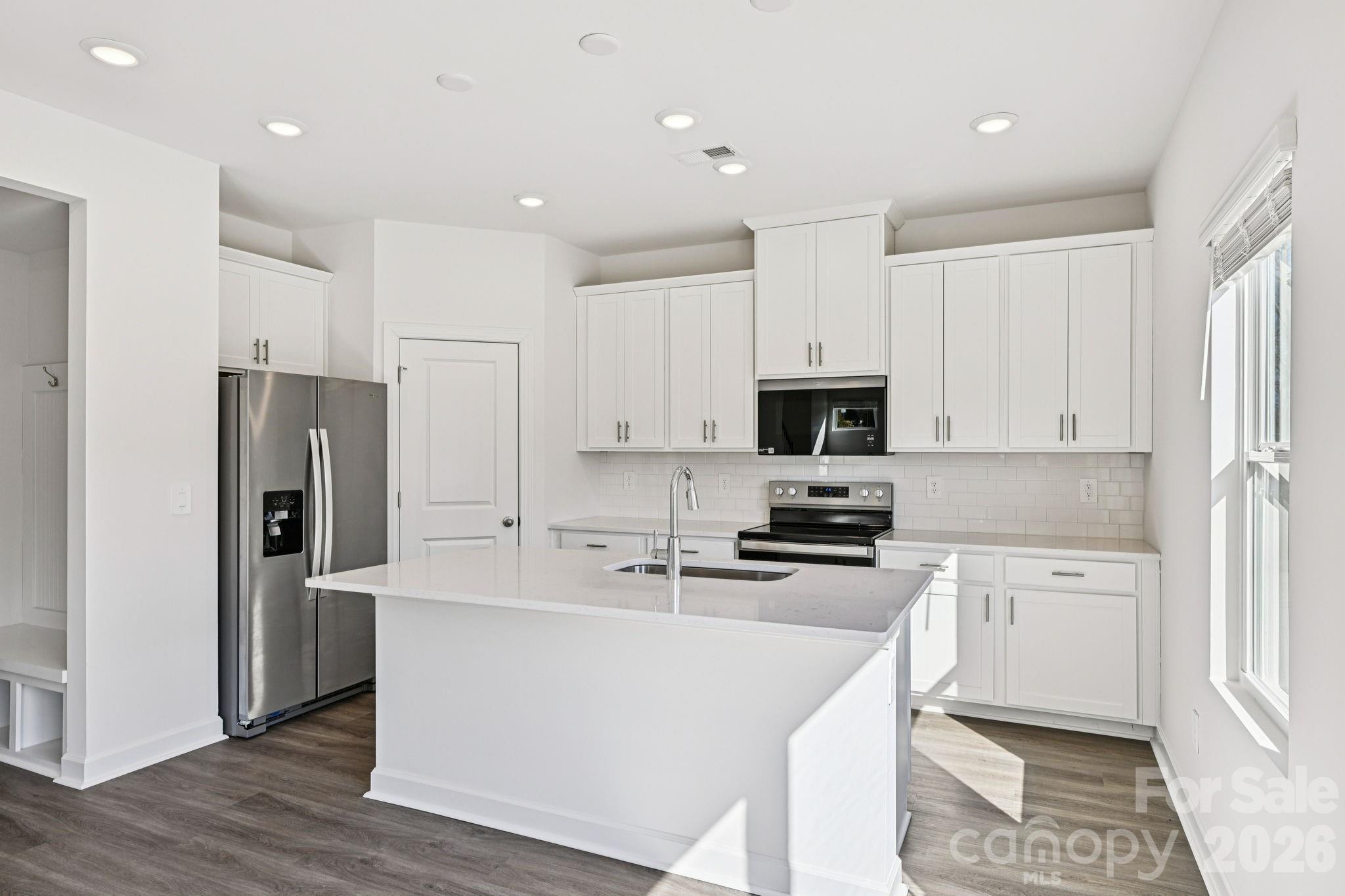 Photo is not of the actual home, but is an inspirational photo of builder’s model home and may depict options, furnishings, and/or decorator features that are not included - 2320 Snapdragon Court, Stanley