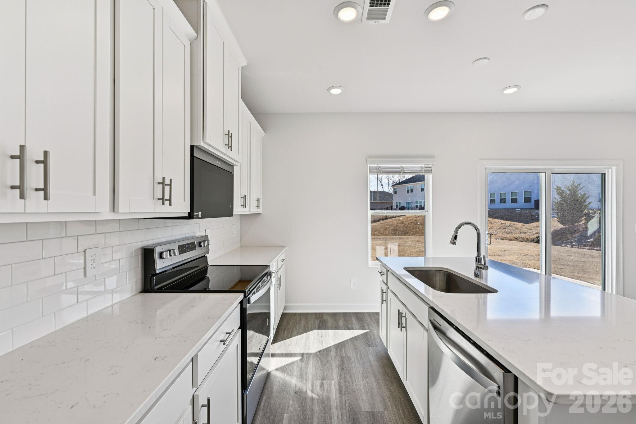 Photo is not of the actual home, but is an inspirational photo of builder’s model home and may depict options, furnishings, and/or decorator features that are not included - 2320 Snapdragon Court, Stanley