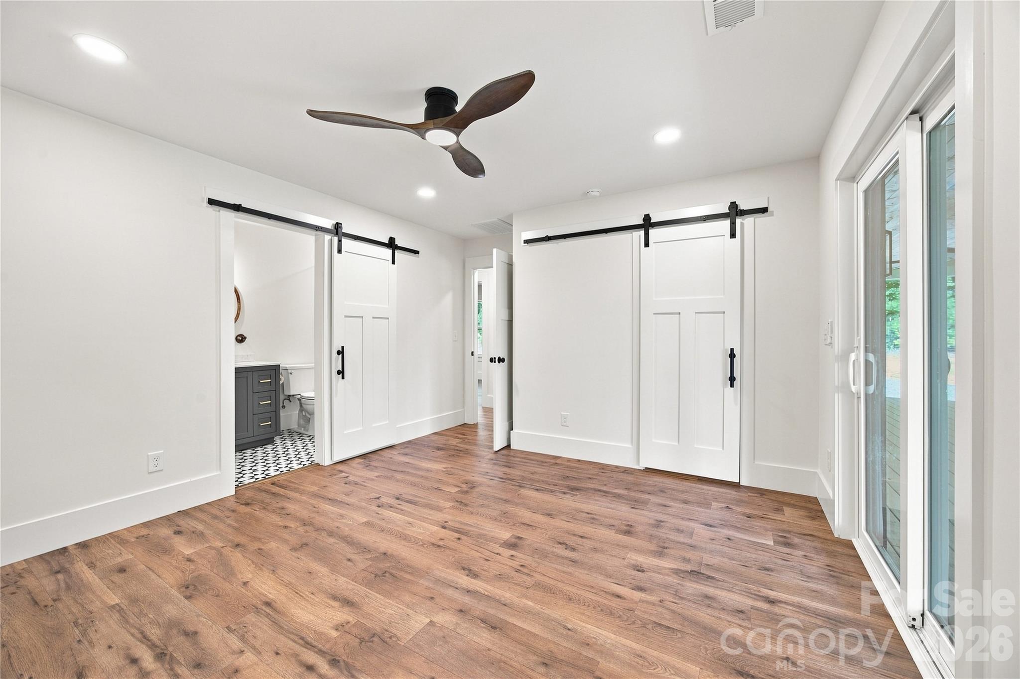 Primary Suite with barn doors - 5663 Mundy Road, Denver