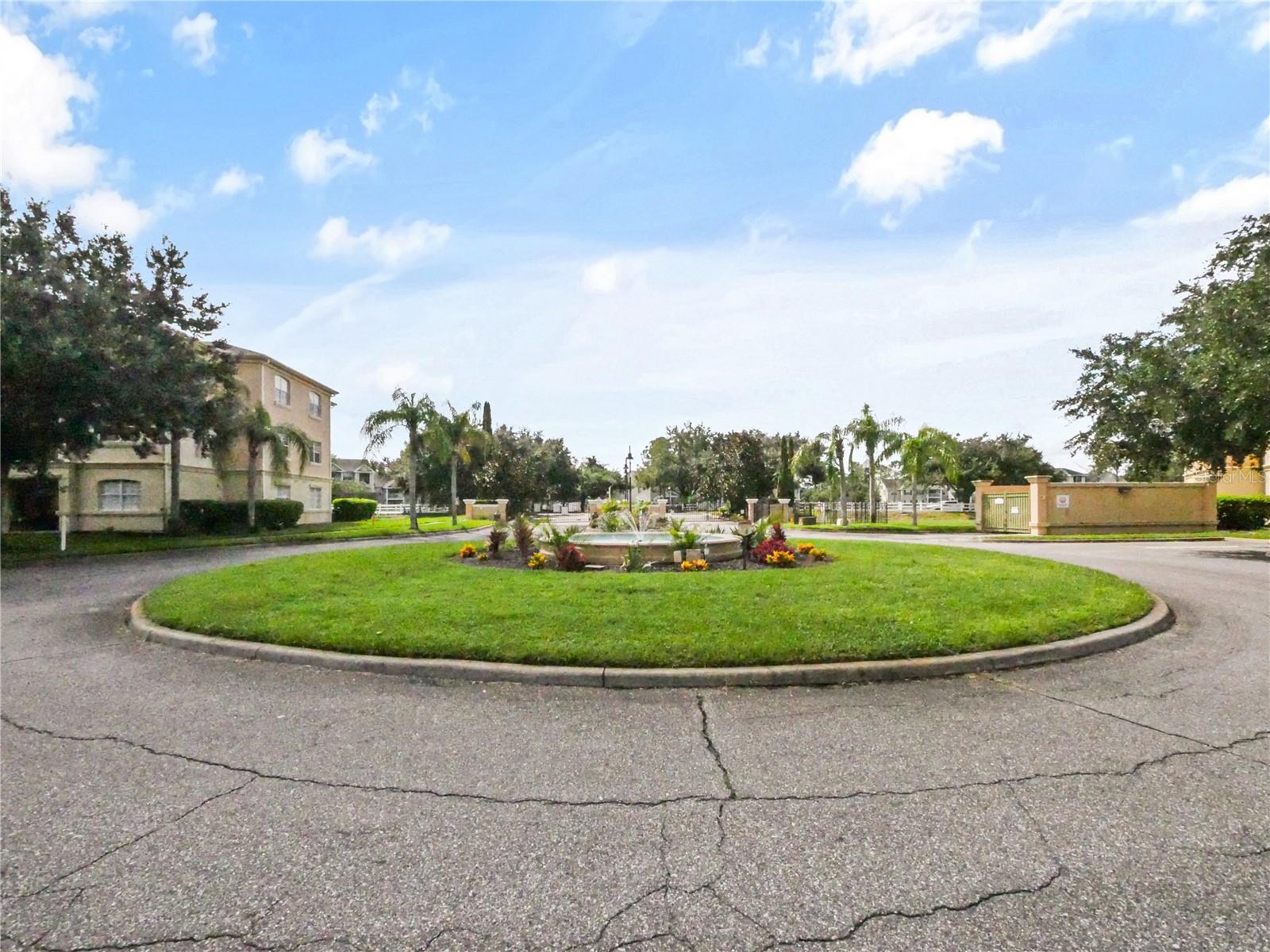 Front entrance and round a bout - 102 TERRACE RIDGE CIR #102, DAVENPORT