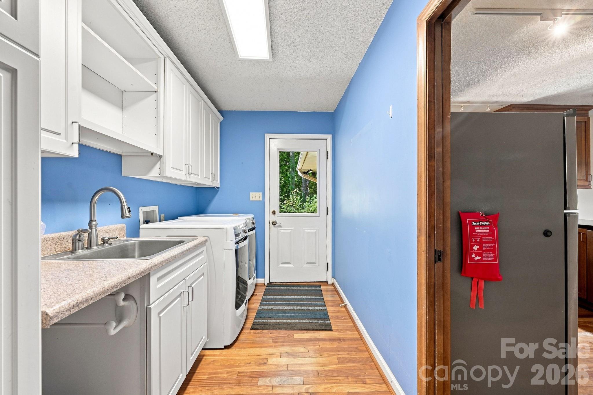 Laundry/MudRoom with Patio Access - 19317 Davidson Concord Road, Davidson