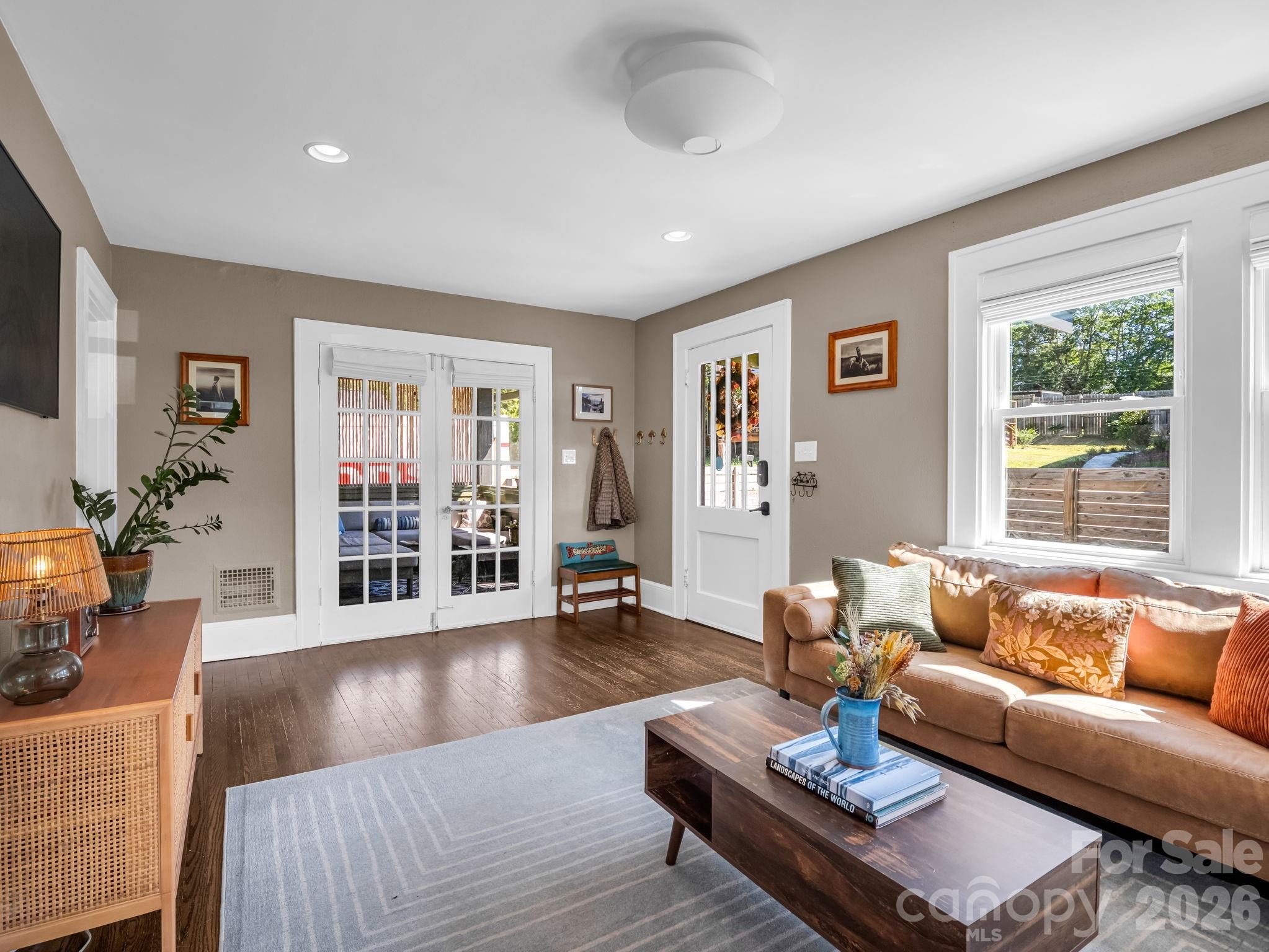 living room with TONS of natural light - 10 Dale Street, Asheville