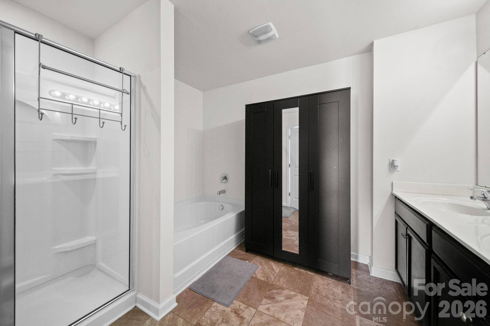 Primary Bath 2 with garden tub and shower - 4104 Long Arrow Drive, Concord