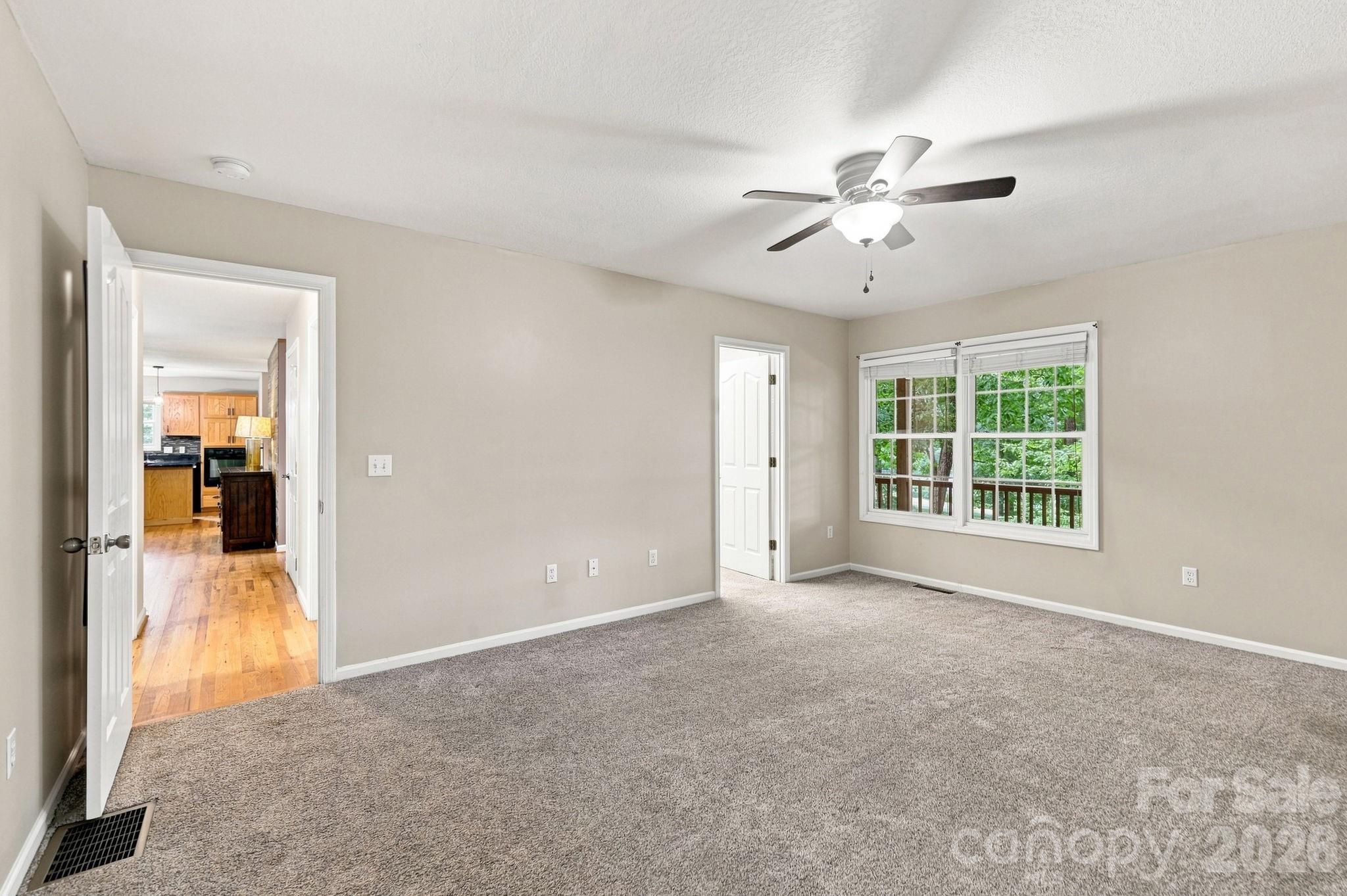 Primary Bedroom on the main level - 95 Holly Ridge Road, Waynesville