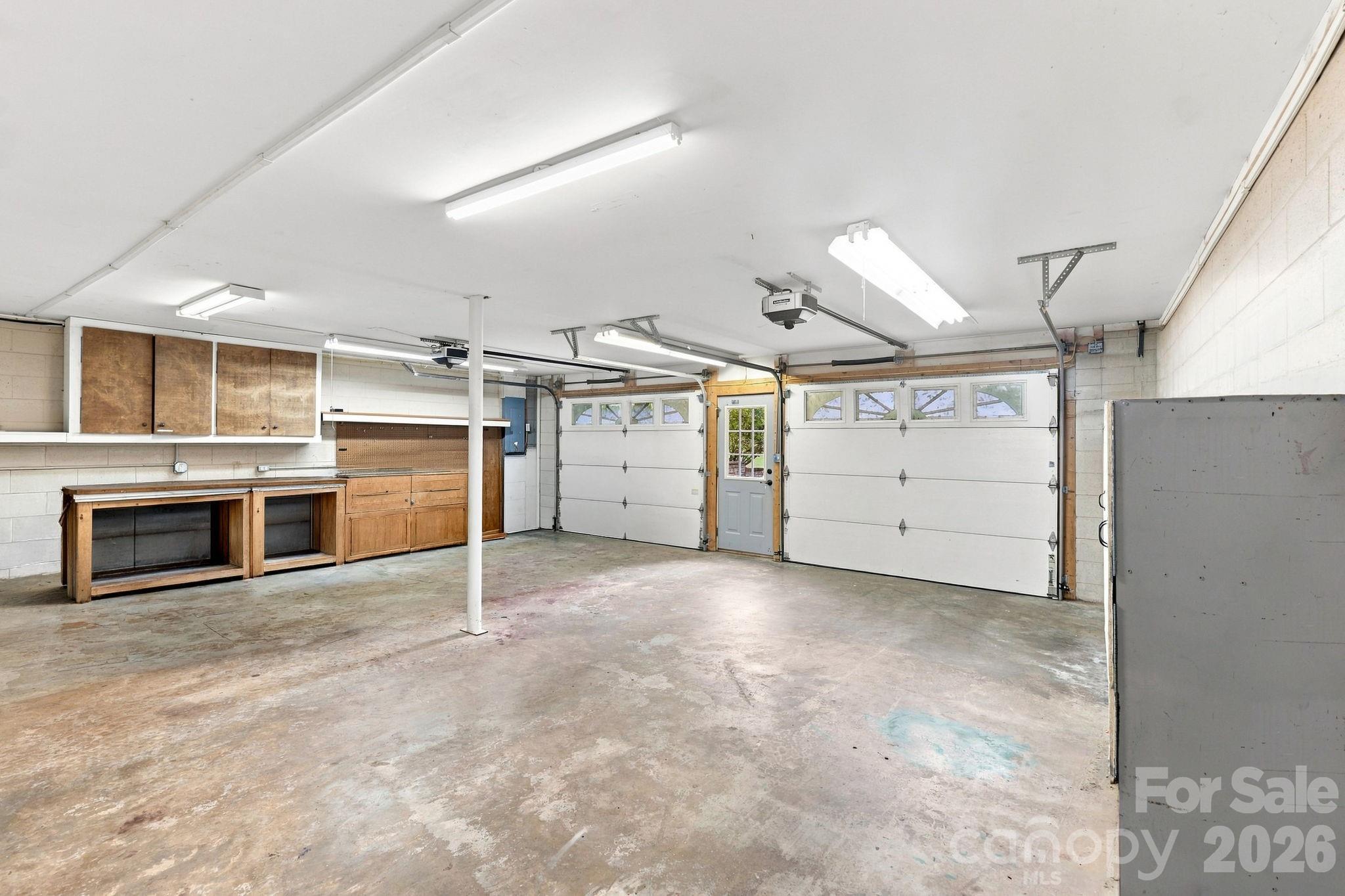 Double Garage with ample storage. - 95 Holly Ridge Road, Waynesville