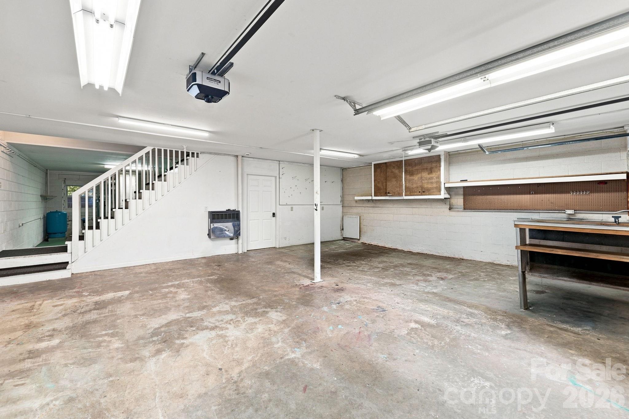 Double Garage with ample storage. - 95 Holly Ridge Road, Waynesville