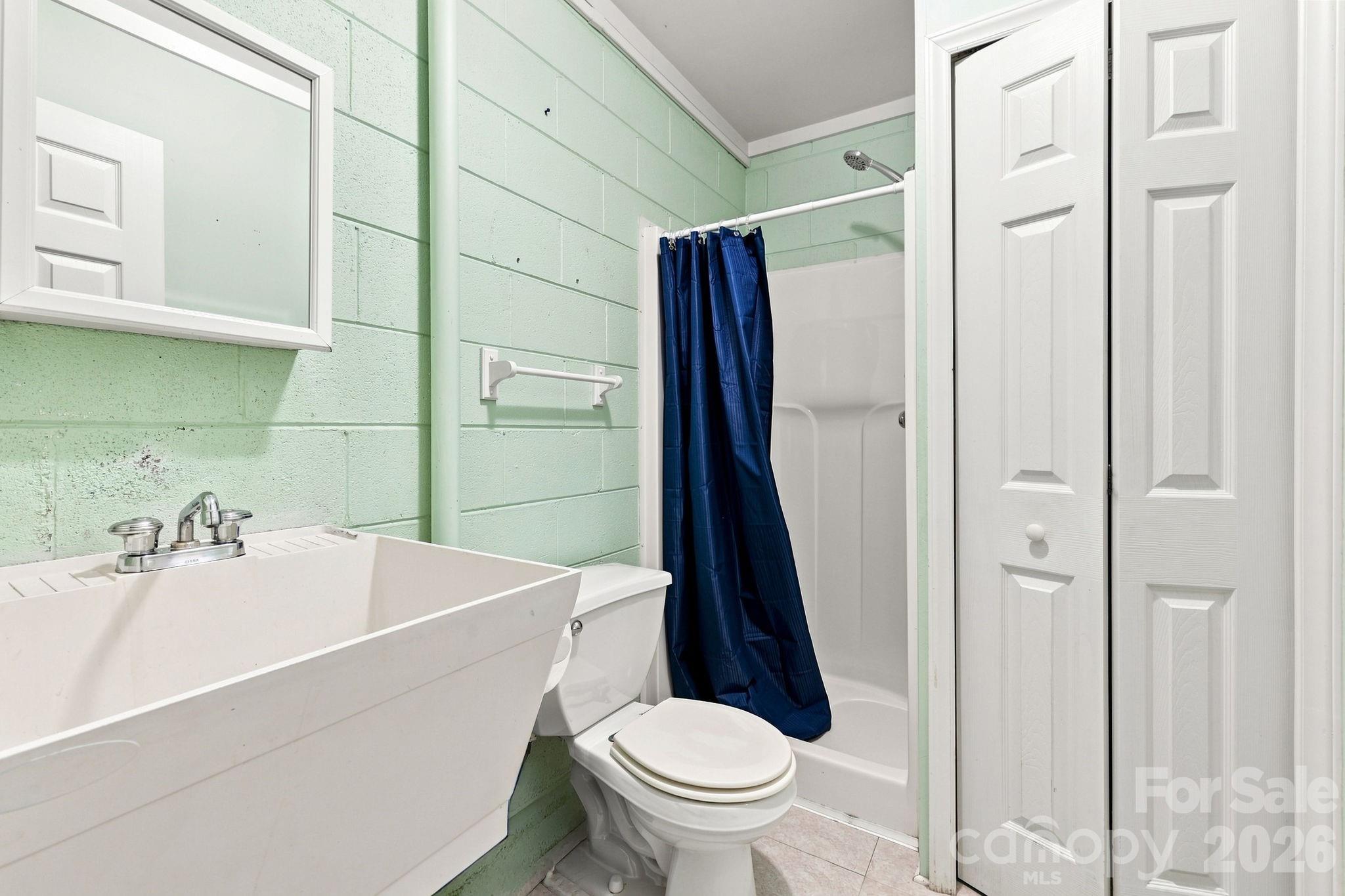 Full bathroom in the basement. - 95 Holly Ridge Road, Waynesville