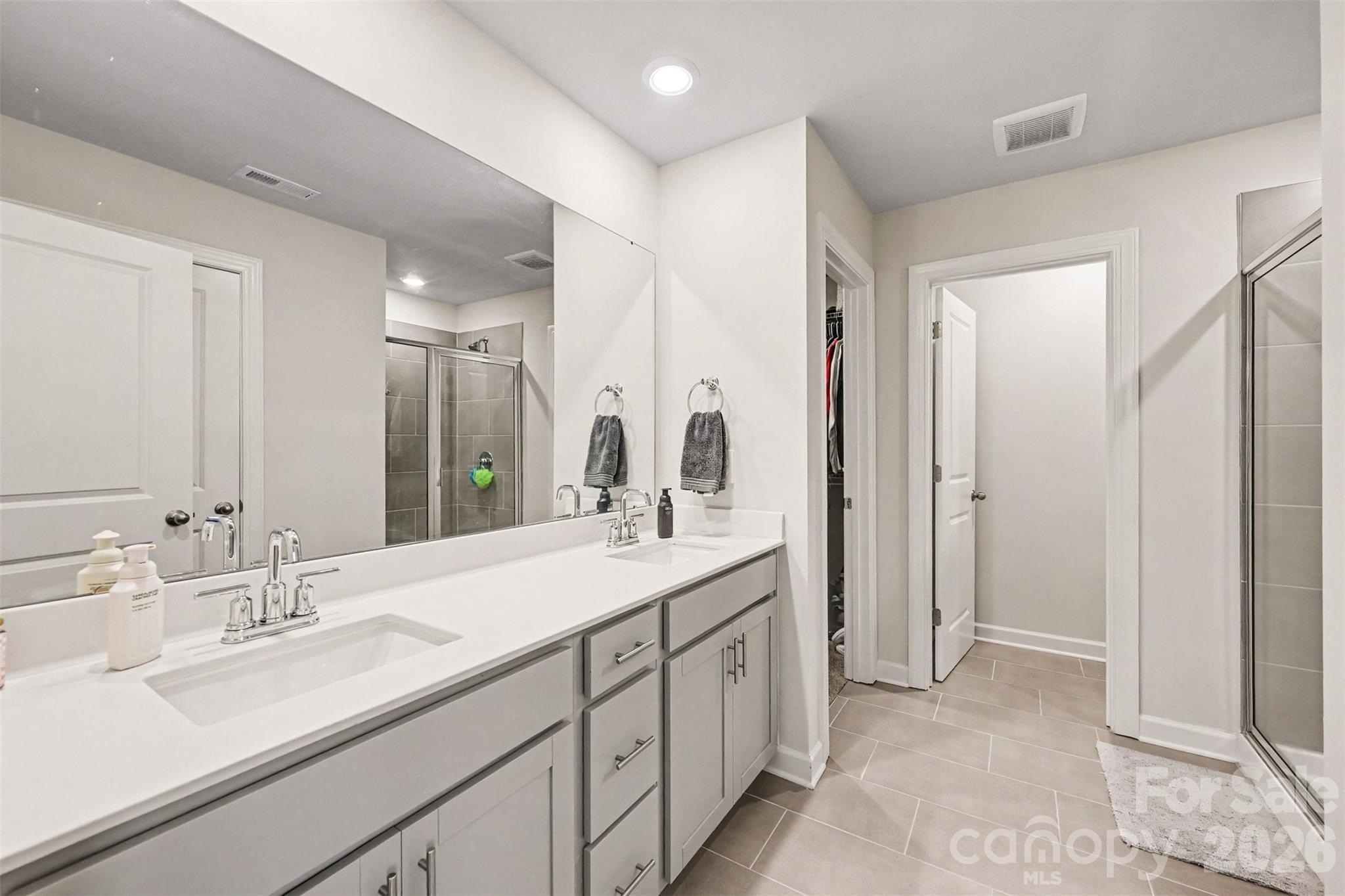 ...dual vanity, and a large walk-in closet. - 408 Luna Lane, Shelby