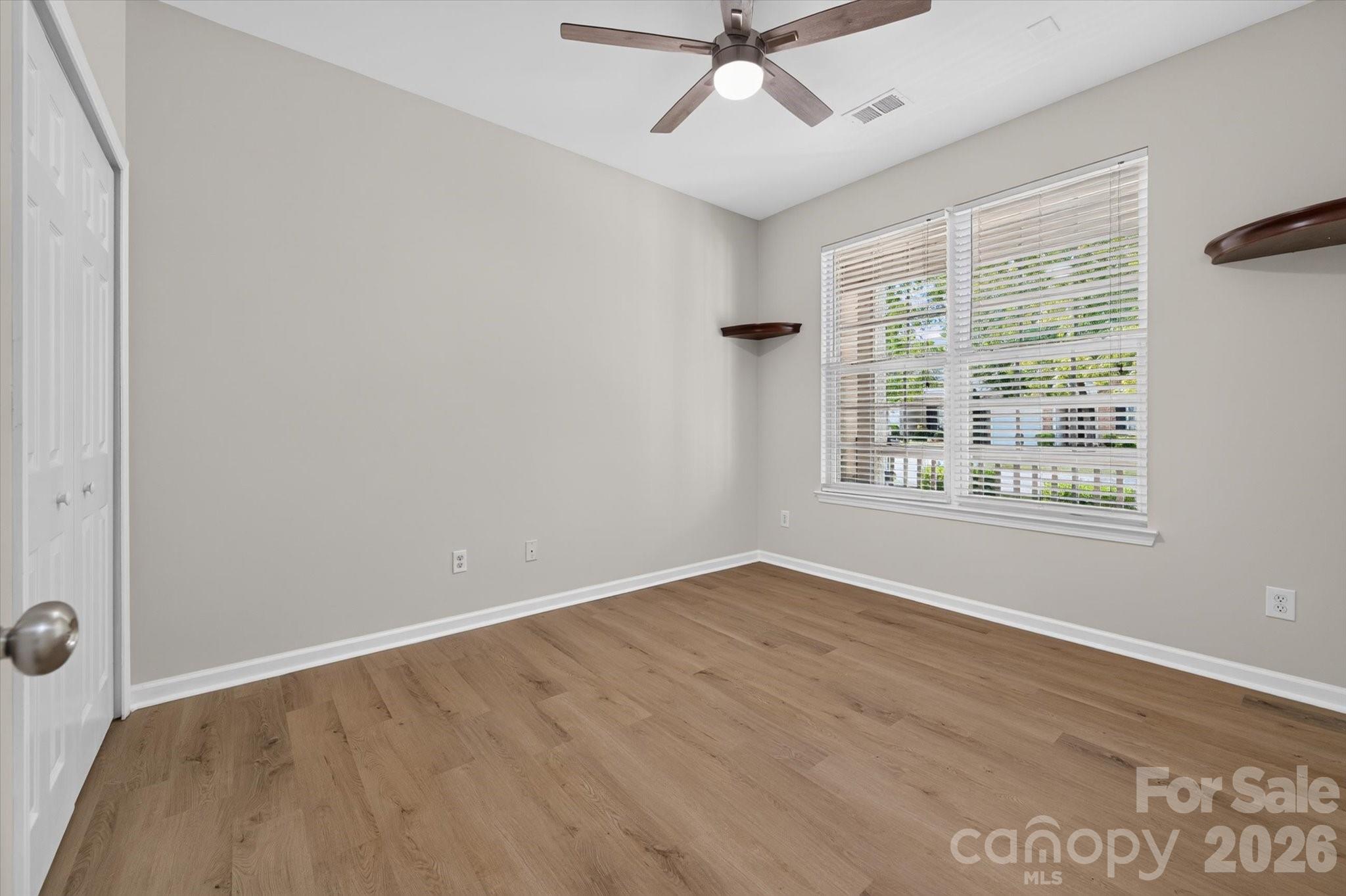 2nd Bedroom with corner shelving, new ceiling fan and spacious closet. - 4641 Willow Glen Road, Harrisburg