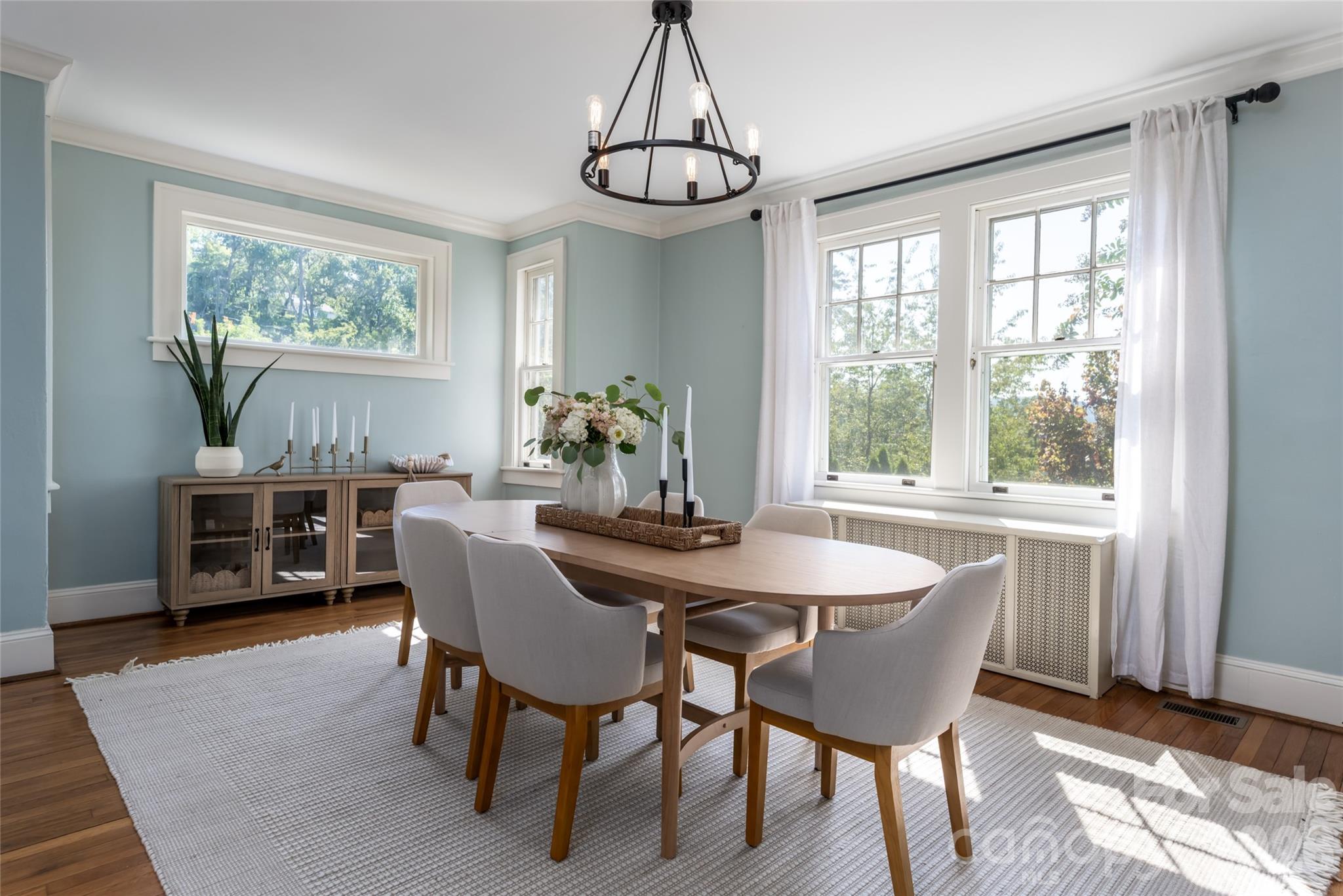The light filled dining room flows into the kitchen seamlessly. - 35 Elias Place, Asheville
