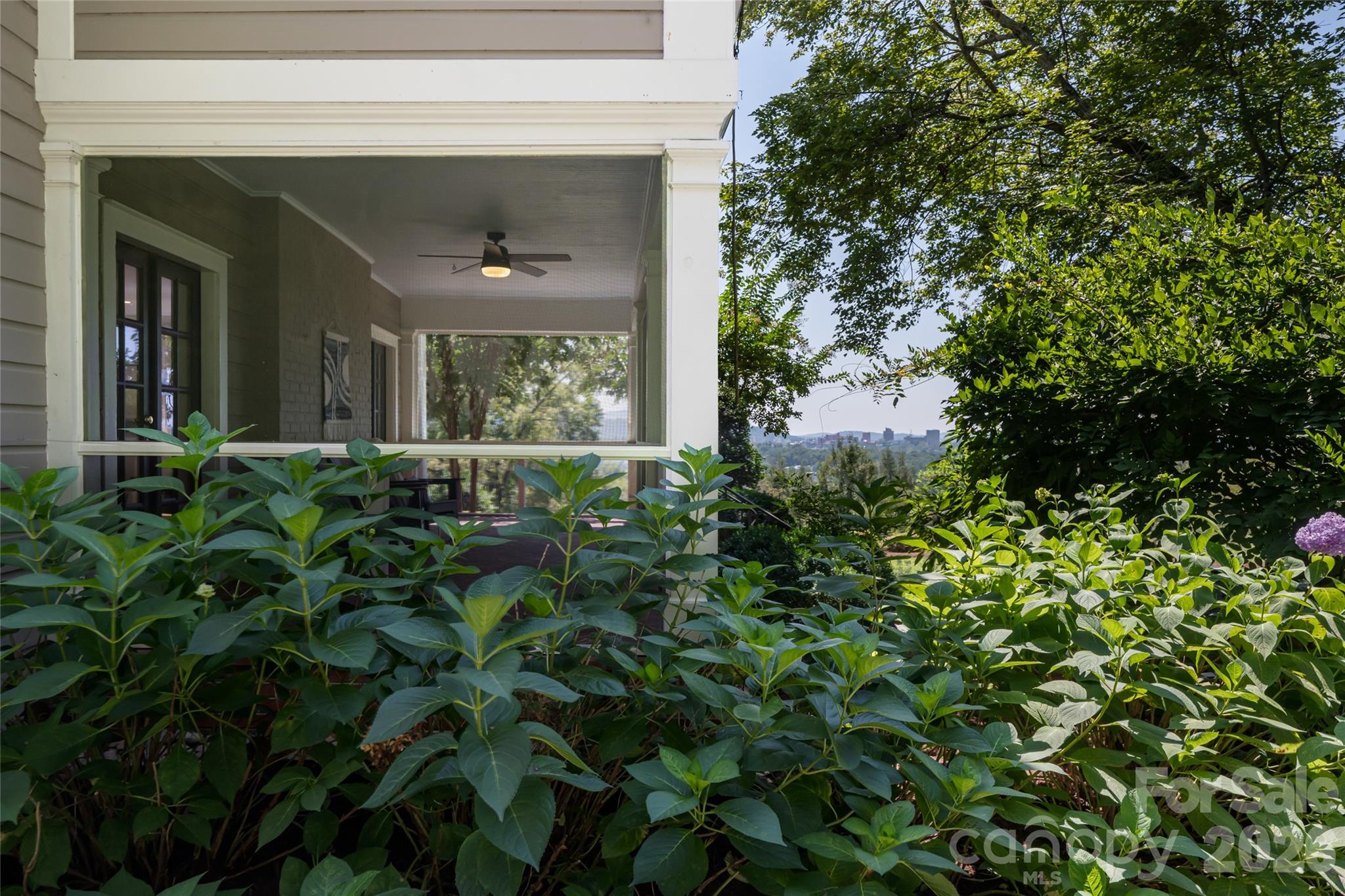 The stunning landscaping is visible from all over the property - 35 Elias Place, Asheville