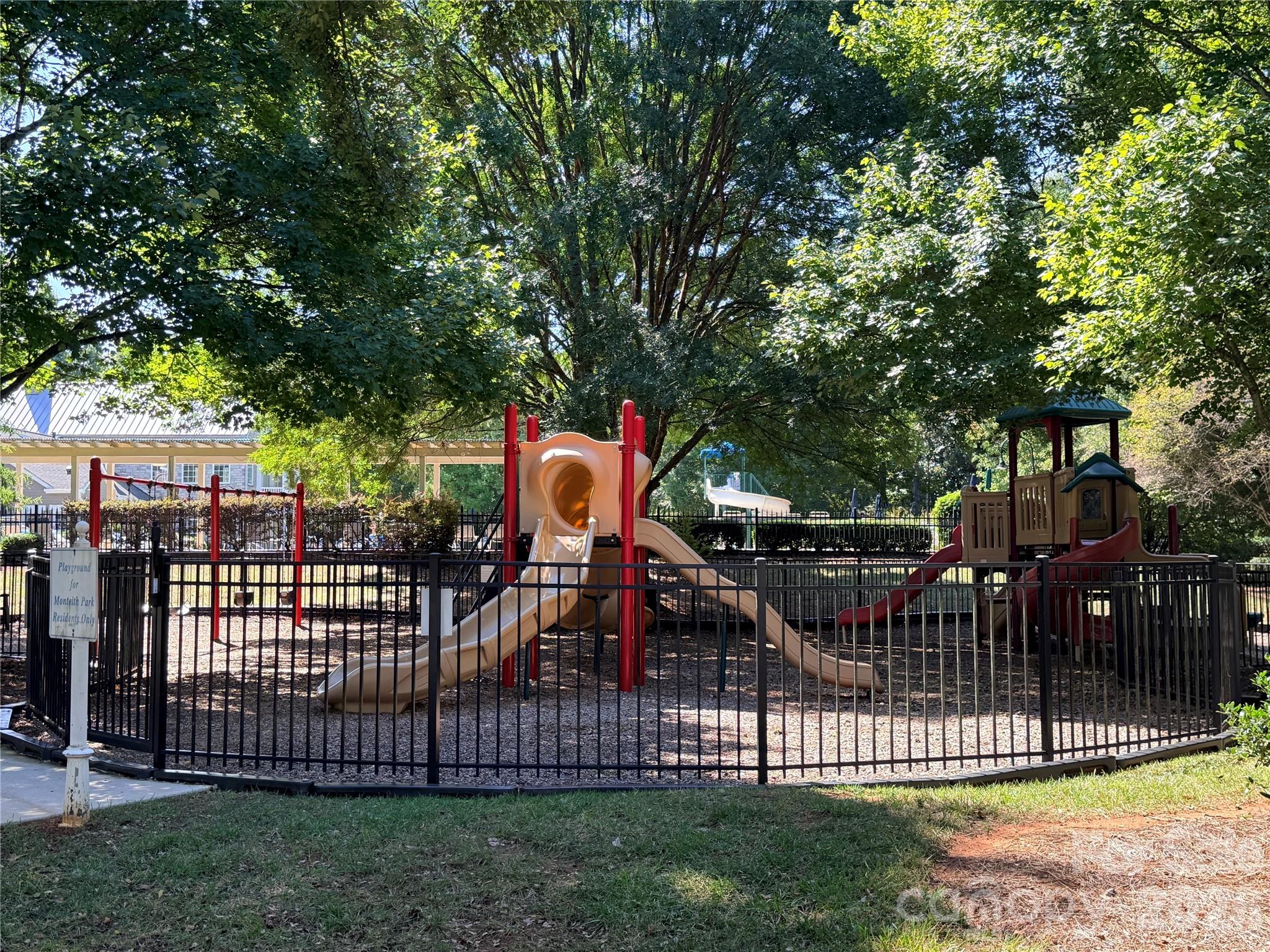 Playground is fully fenced for safety - 14525 Holly Springs Drive, Huntersville