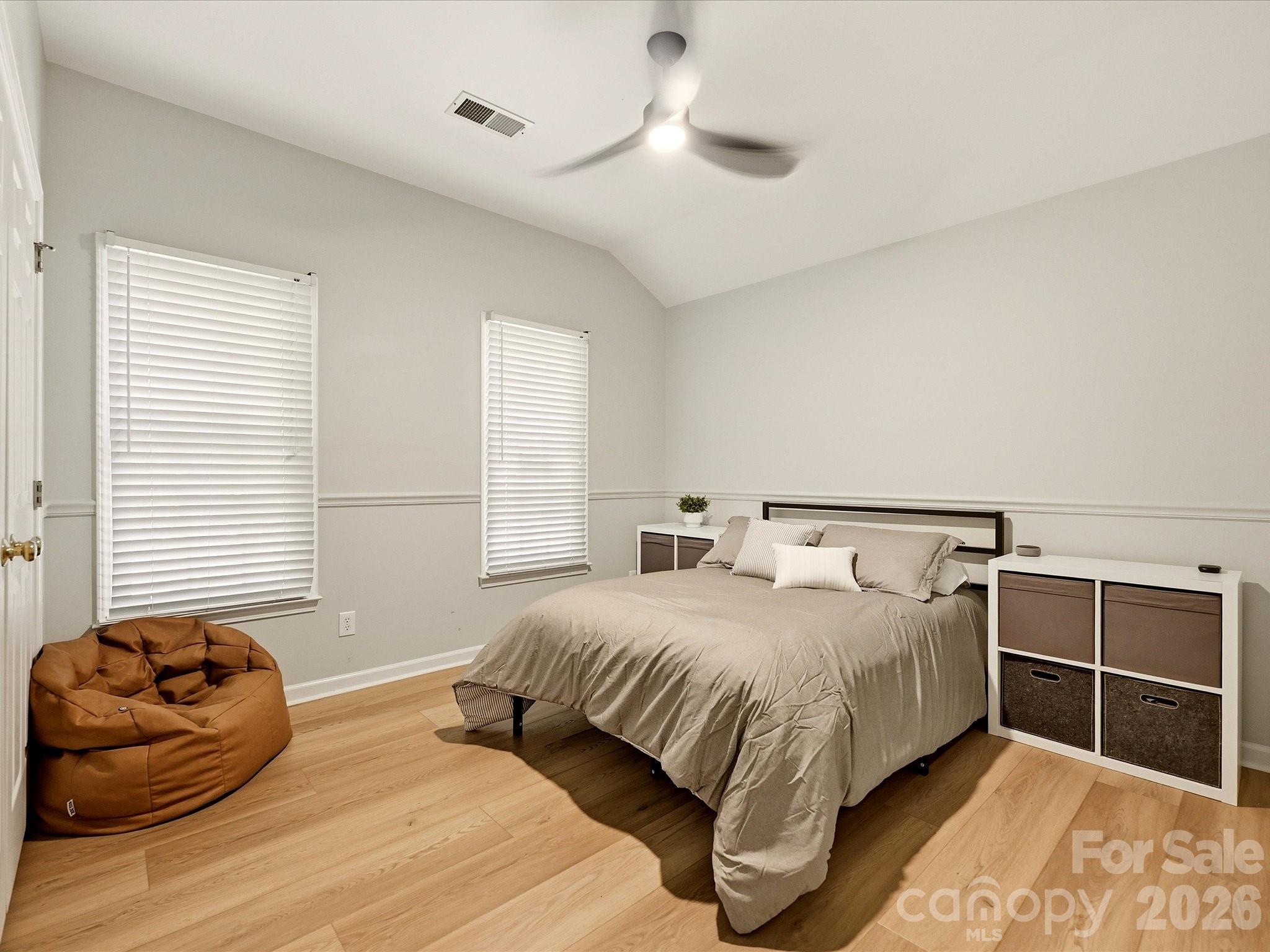 Additional secondary bedroom offers abundant natural light, generous space, and flexible functionality. - 19706 Valiant Way, Cornelius