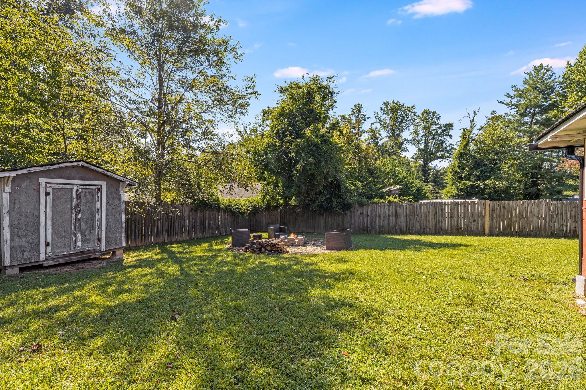 Fully Fenced-In Back Yard with Shed - 376 School Road E, Asheville