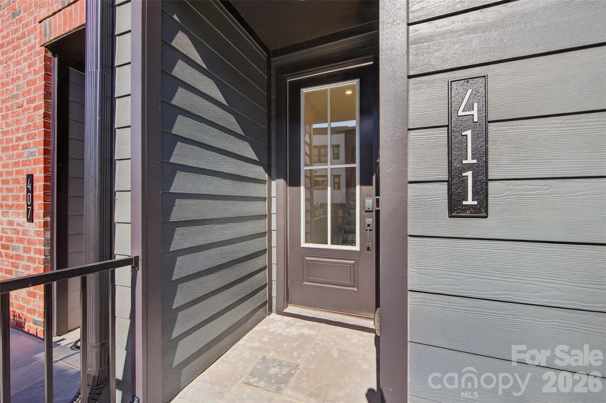 Covered front door - 411 Old Town Village Road, Waxhaw