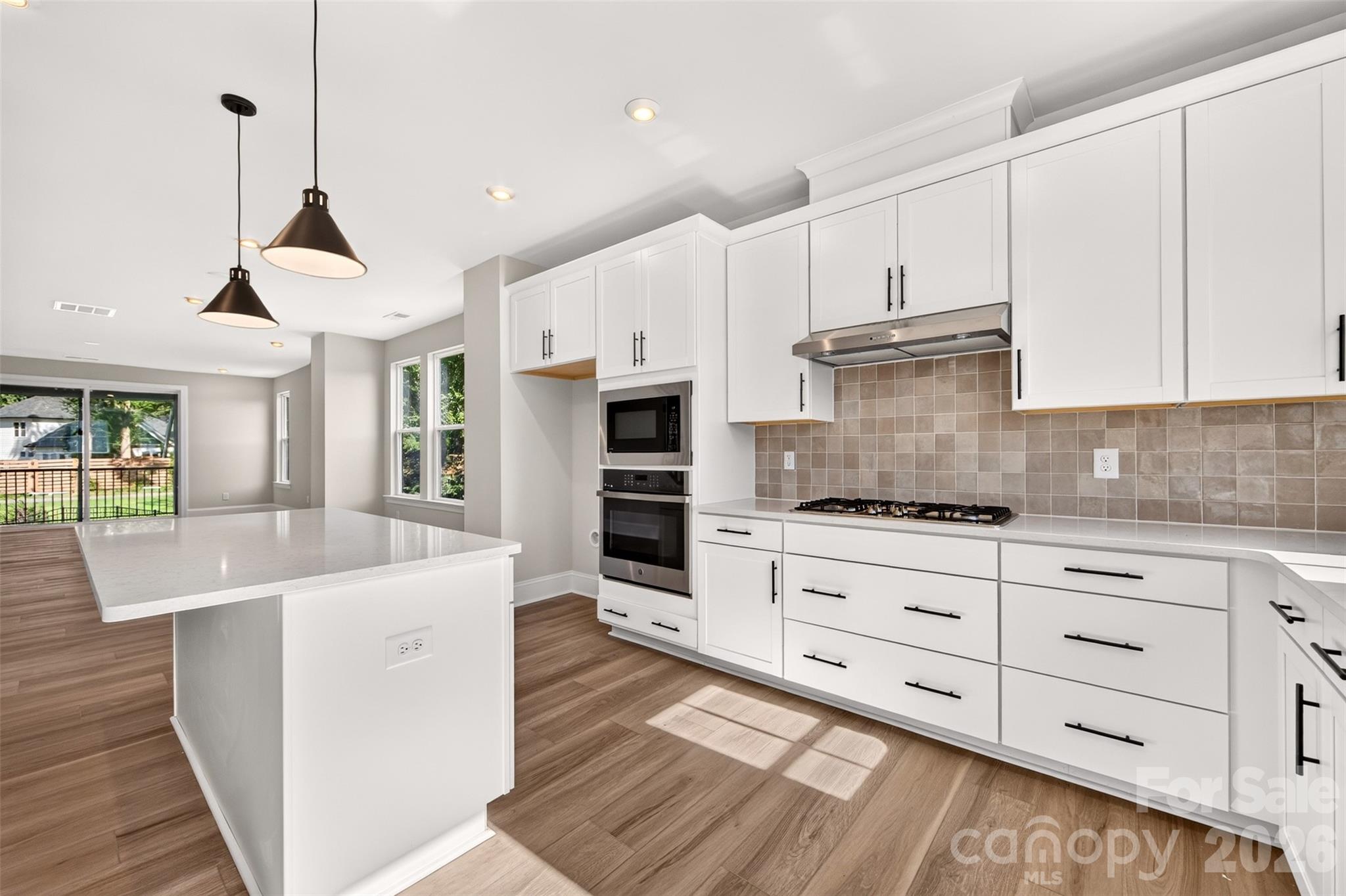 Ample storage in the gourmet kitchen - 411 Old Town Village Road, Waxhaw