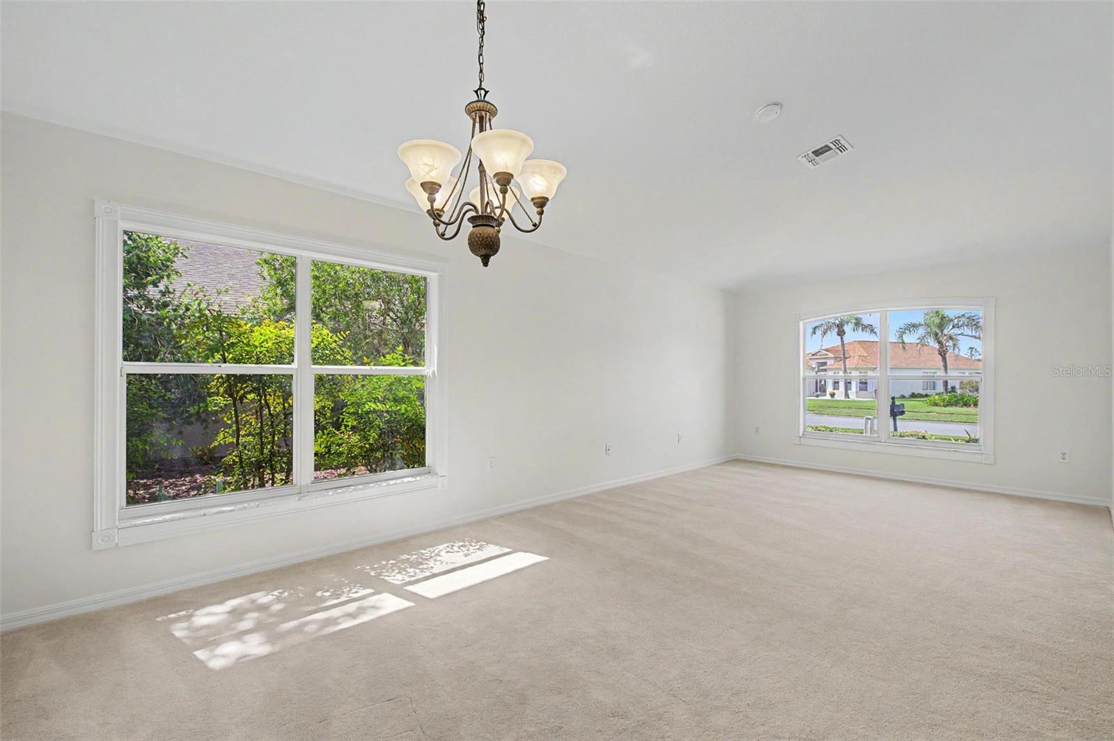 living room/dining room - 11709 SPINDRIFT LOOP, HUDSON