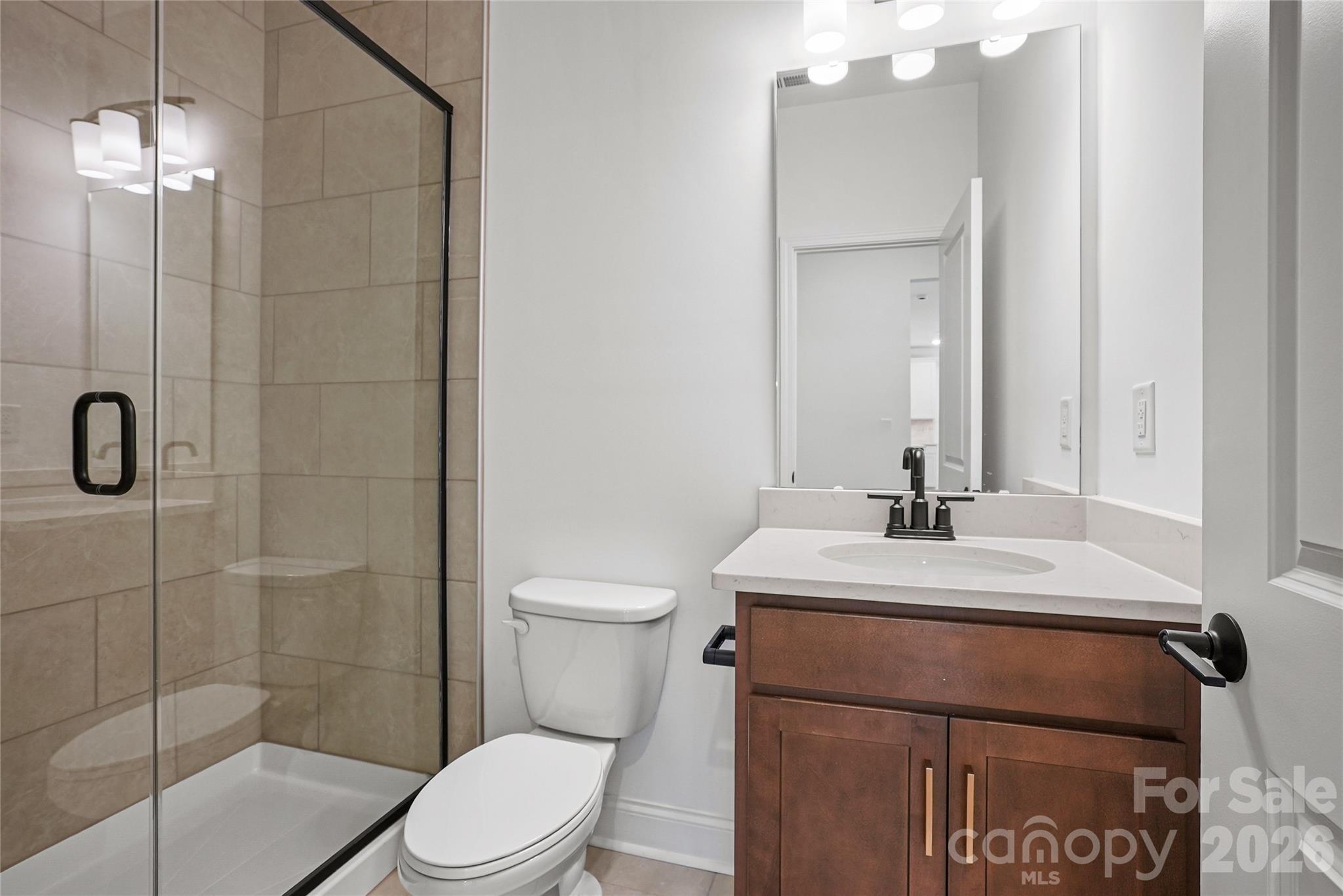 1st floor full guest bathroom - 1210 Chasity Trails Court, Matthews