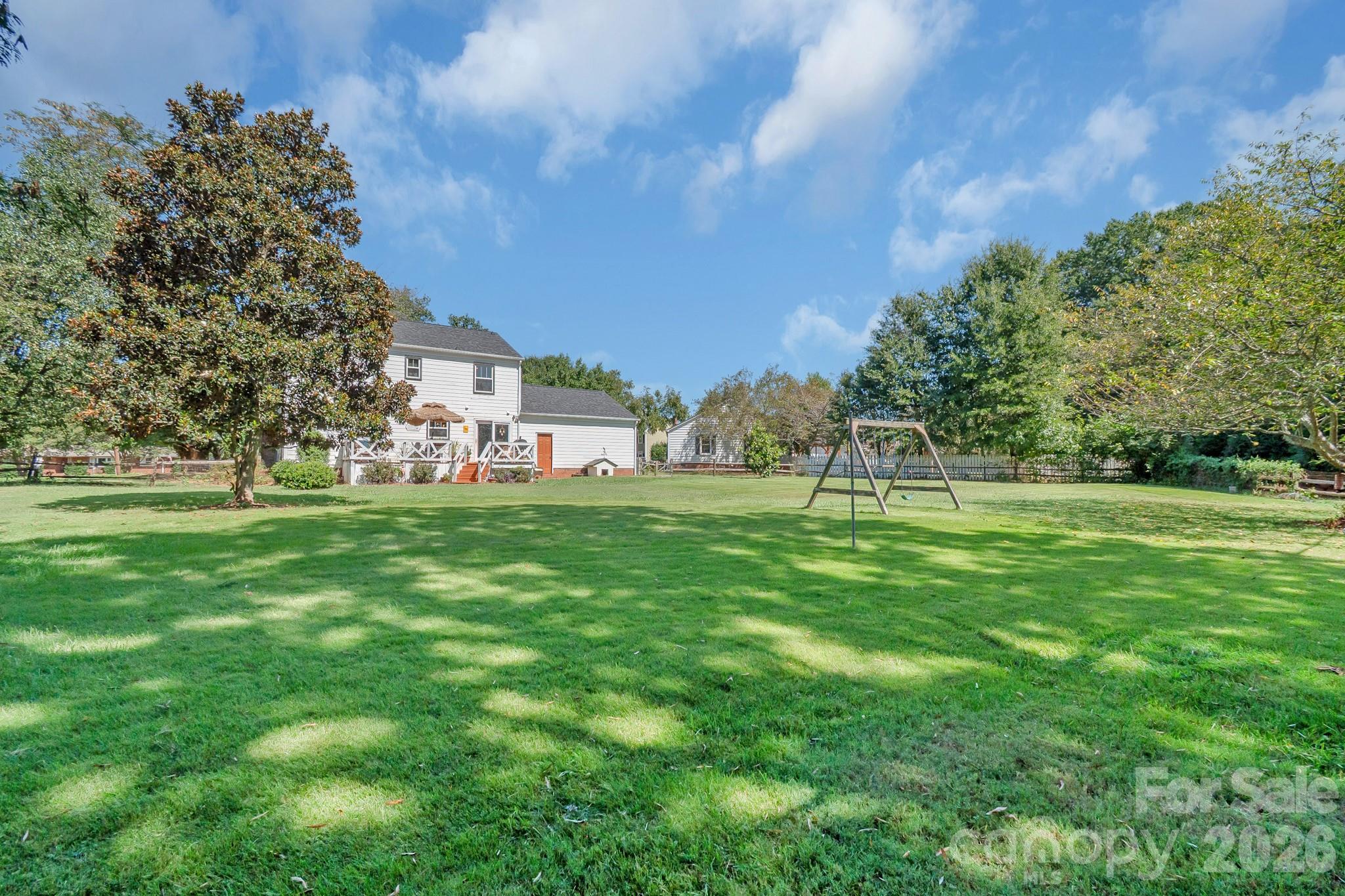 Looking at the house from the fence. - 13136 Blacksmith Court, Matthews