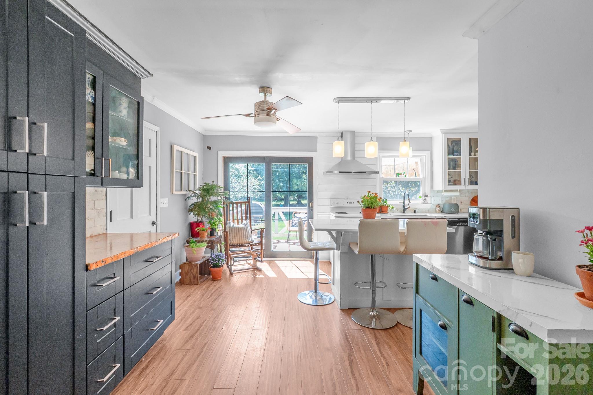 View from the dining room to the kitchen area - 13136 Blacksmith Court, Matthews
