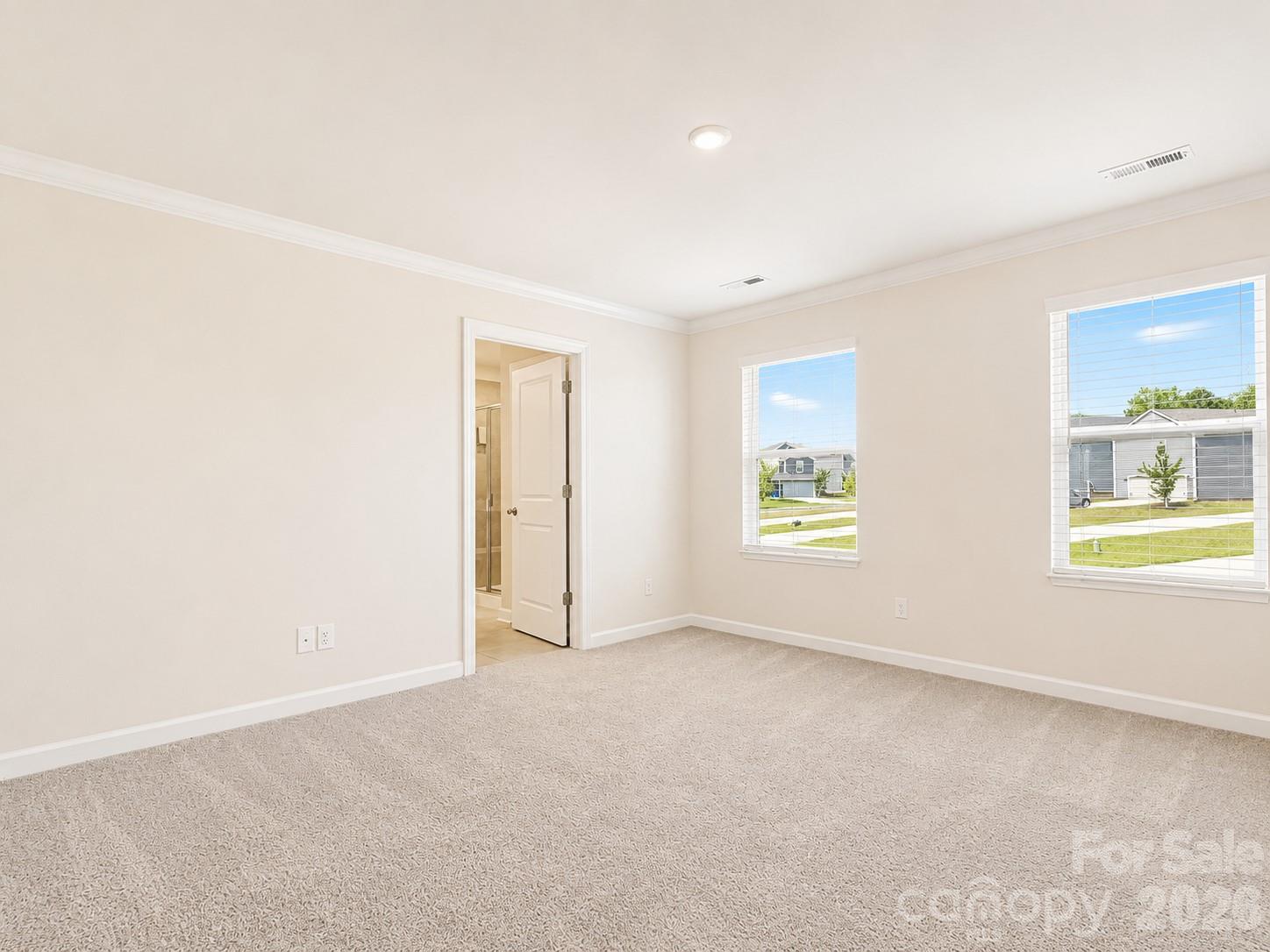 Primary Bedroom with ensuite bath & large walk-in closet! - 518 Nixon Road, Belmont
