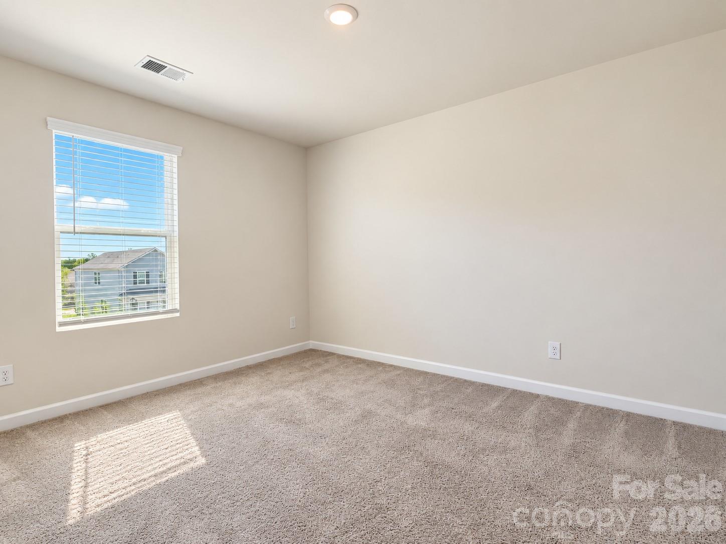 Guest bedroom with upstairs split floor plan off the loft. - 518 Nixon Road, Belmont