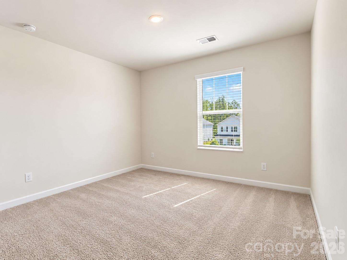 Guest bedroom with upstairs split floor plan off the loft. - 518 Nixon Road, Belmont