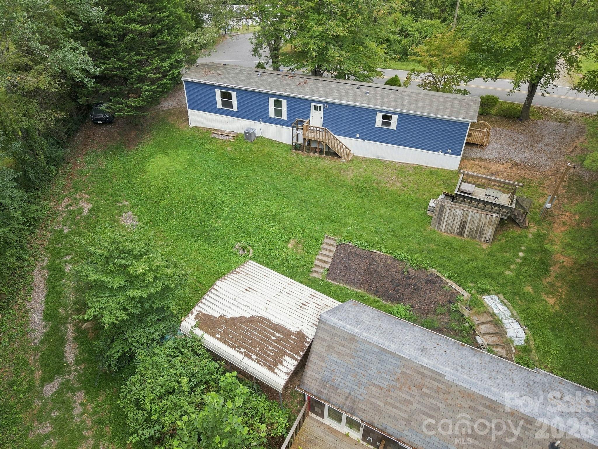 Separated enough, but also close enough! (Angle is hard to appreciate; must see in person to appreciate!):) - 146 & 148 Bradshaw Circle, Candler