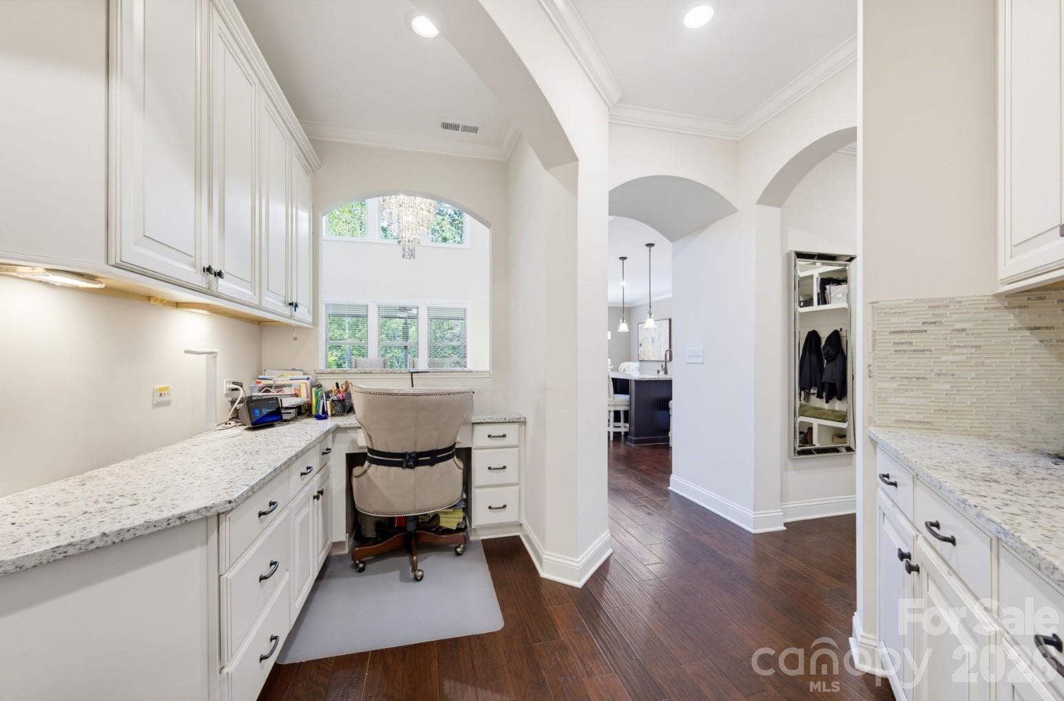 Built-in desk area and huge butler's pantry off the kitchen. - 270 S San Agustin Drive, Mooresville