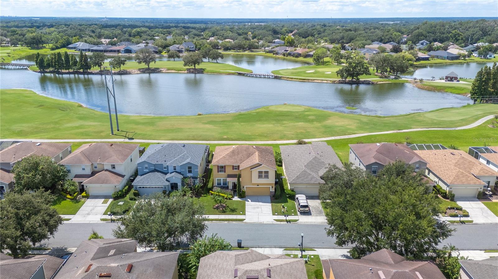 Aerial view features the view from the rear covered patio of this lovely home - 6937 LAKE EAGLEBROOKE DR, LAKELAND