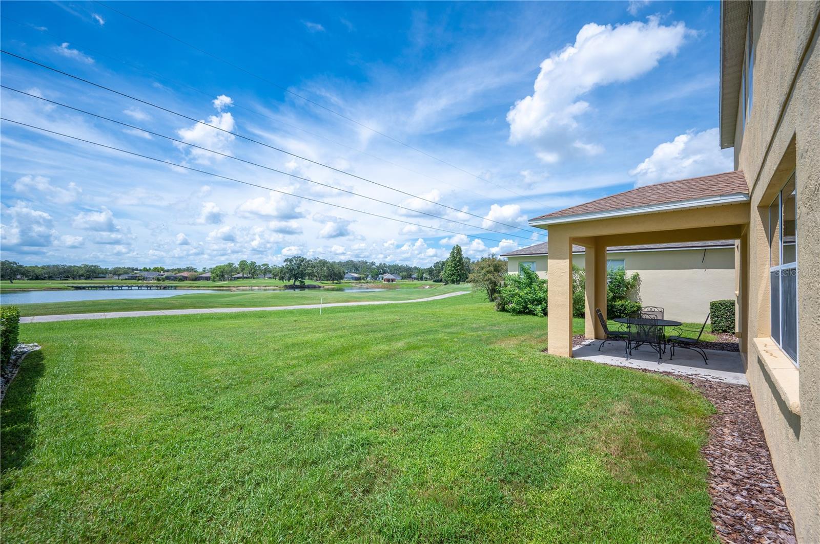 The back yard is spacious and has room for a pool - 6937 LAKE EAGLEBROOKE DR, LAKELAND