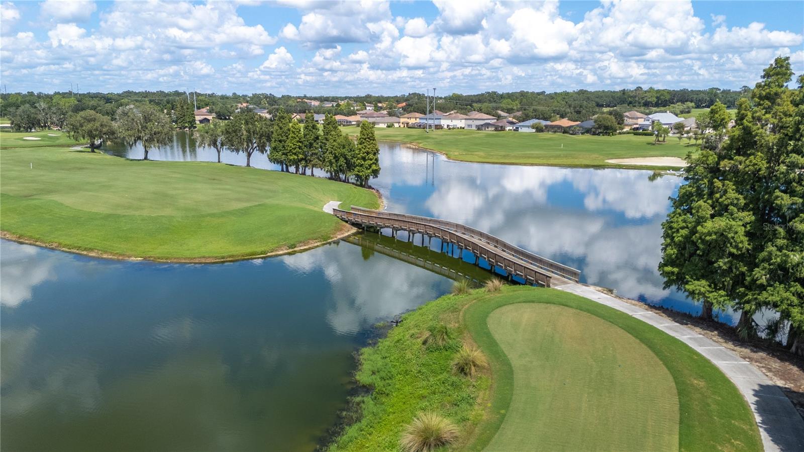 The 15th hole and bridge to the 14th hole on the golf course at The Club at Eaglebrooke - 6937 LAKE EAGLEBROOKE DR, LAKELAND