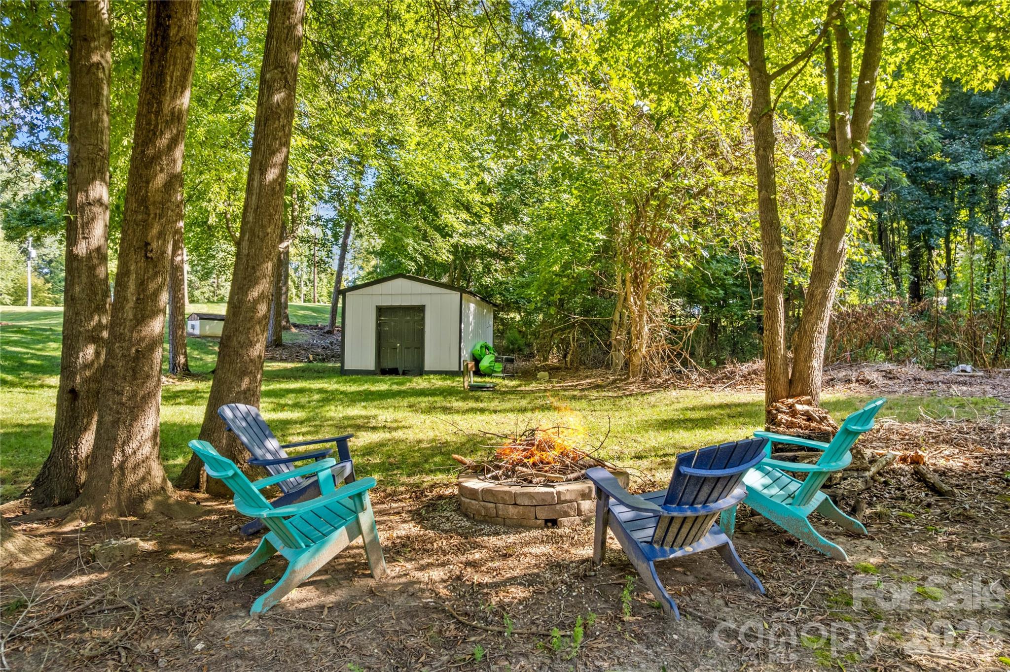 Fire pit viewed from the lake - 150 Shady Cove Drive, Troutman