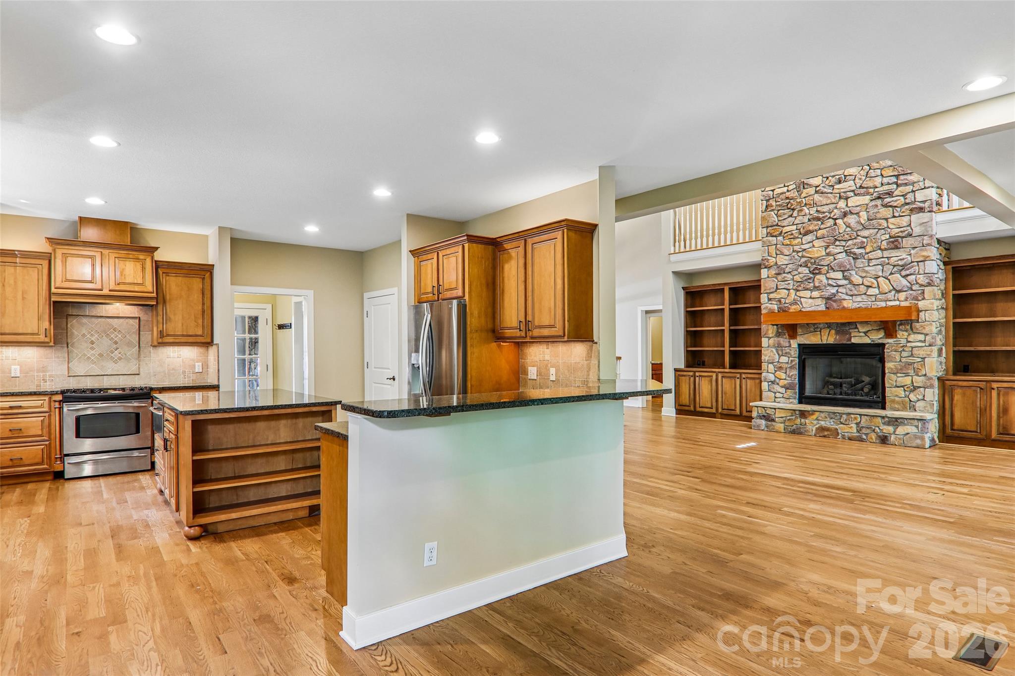 View from the kitchen into the great room - 361 Mills River Way, Horse Shoe