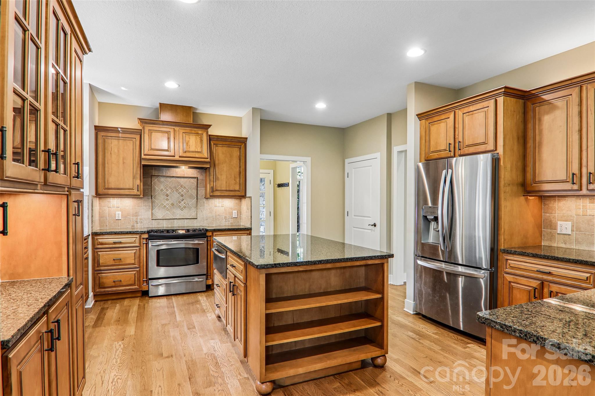 Kitchen features a breakfast bar and island - 361 Mills River Way, Horse Shoe