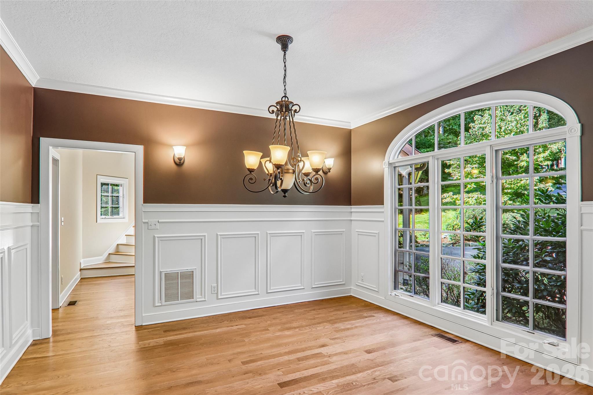 Formal dining room with views to the bonus room stairs - 361 Mills River Way, Horse Shoe