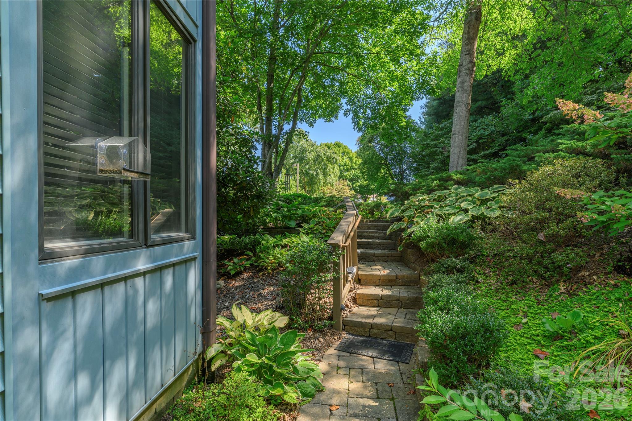 Attractive walkway to beautiful end unit. - 87 Willow Road, Waynesville