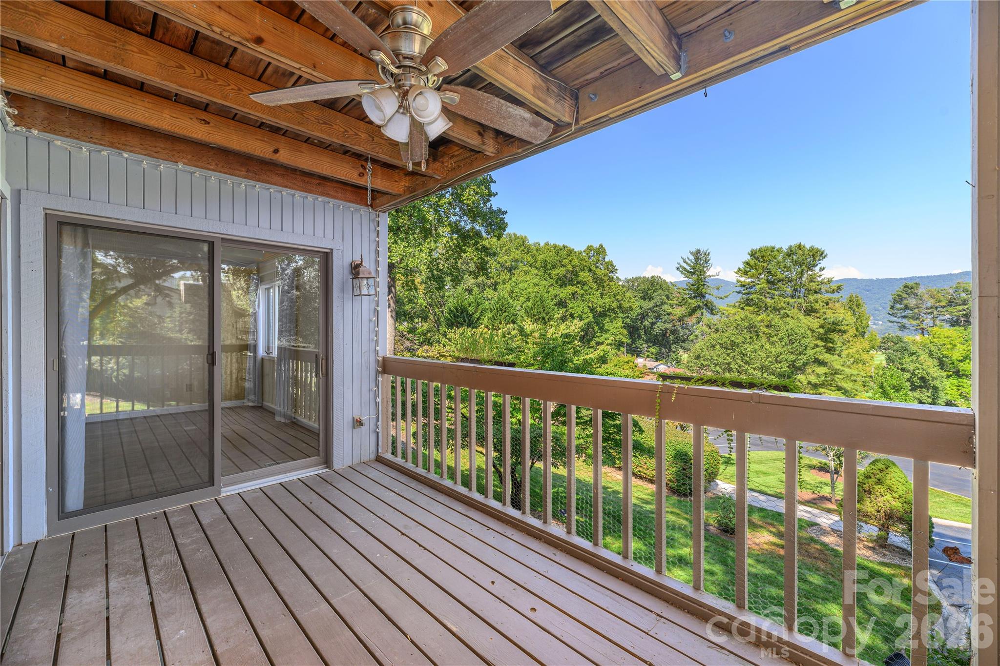 Porch off of Great Room & Primary Bedroom. - 87 Willow Road, Waynesville