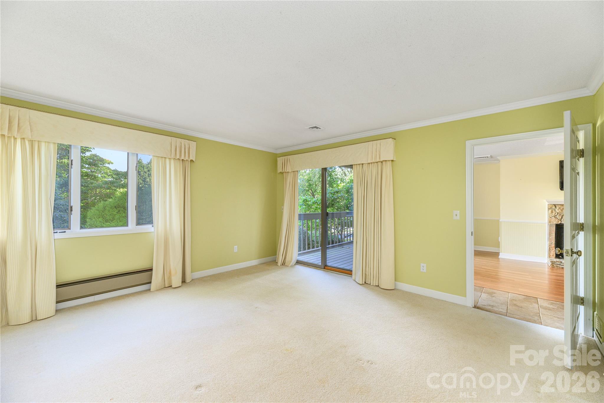 Downstairs Primary bedroom-porch access. - 87 Willow Road, Waynesville