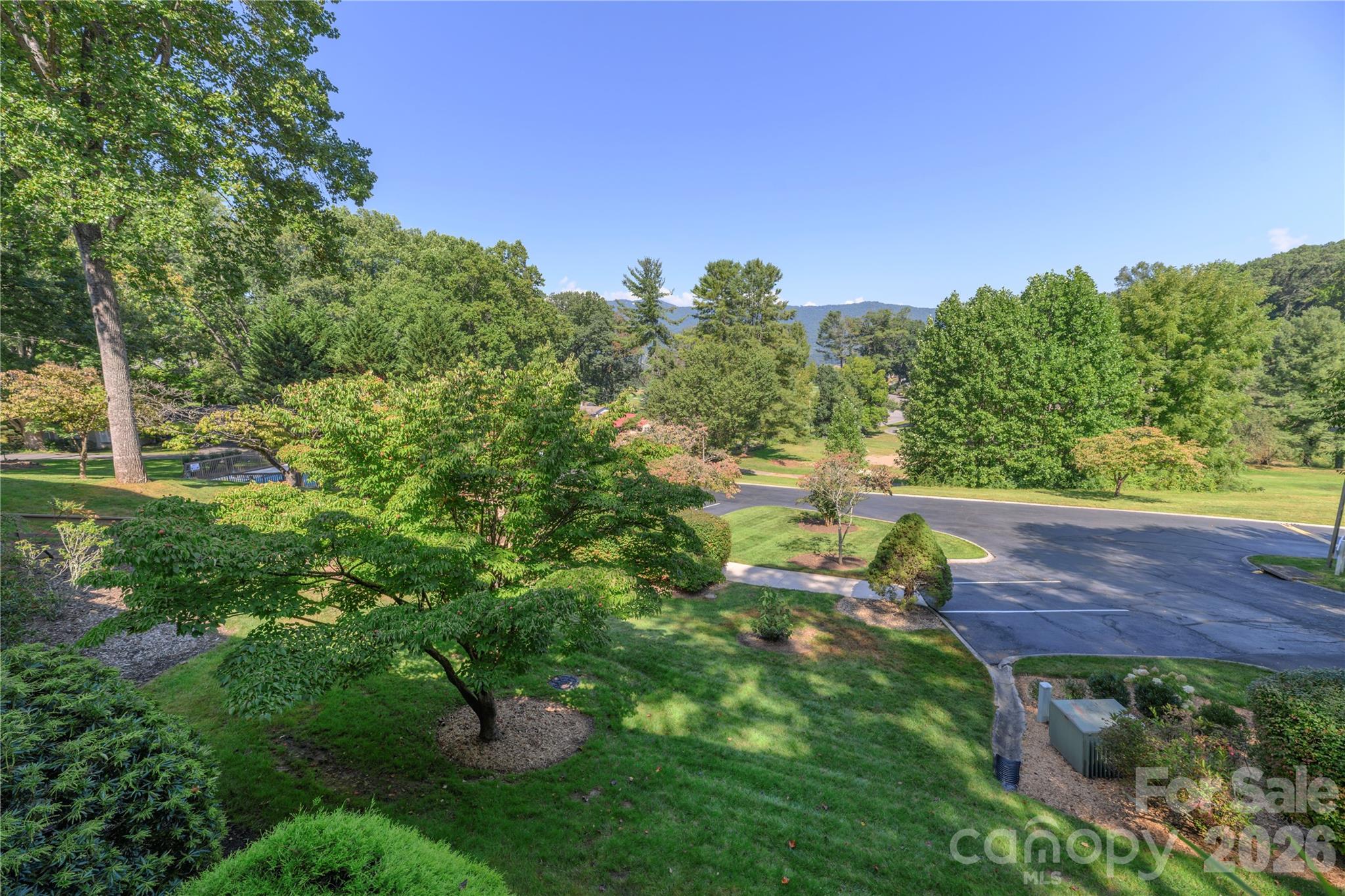 Golf course view from lower porch. - 87 Willow Road, Waynesville