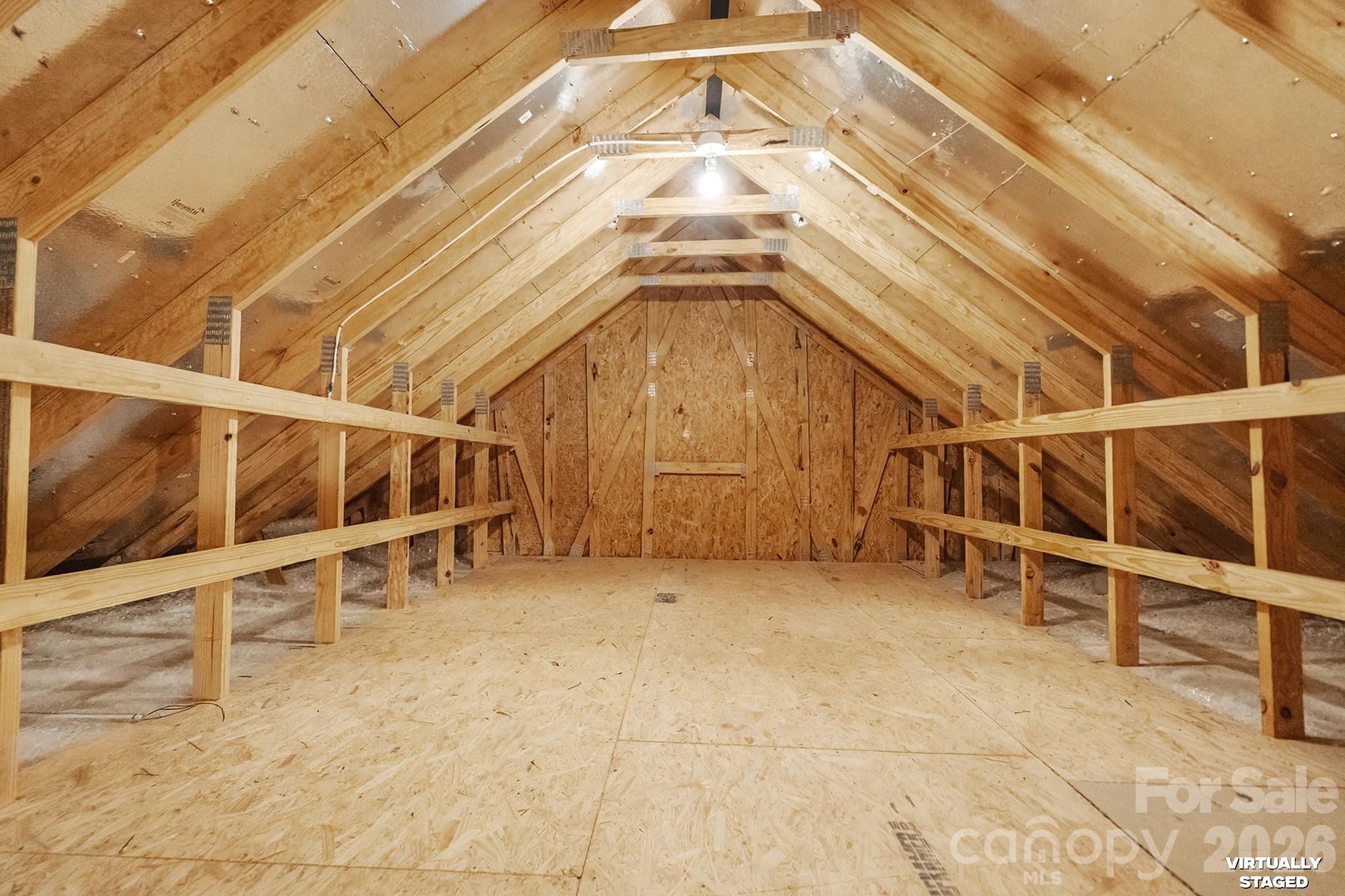 Walk-up Attic Storage. Accessible from the Garage. - 1018 Kirby Drive, Fort Mill