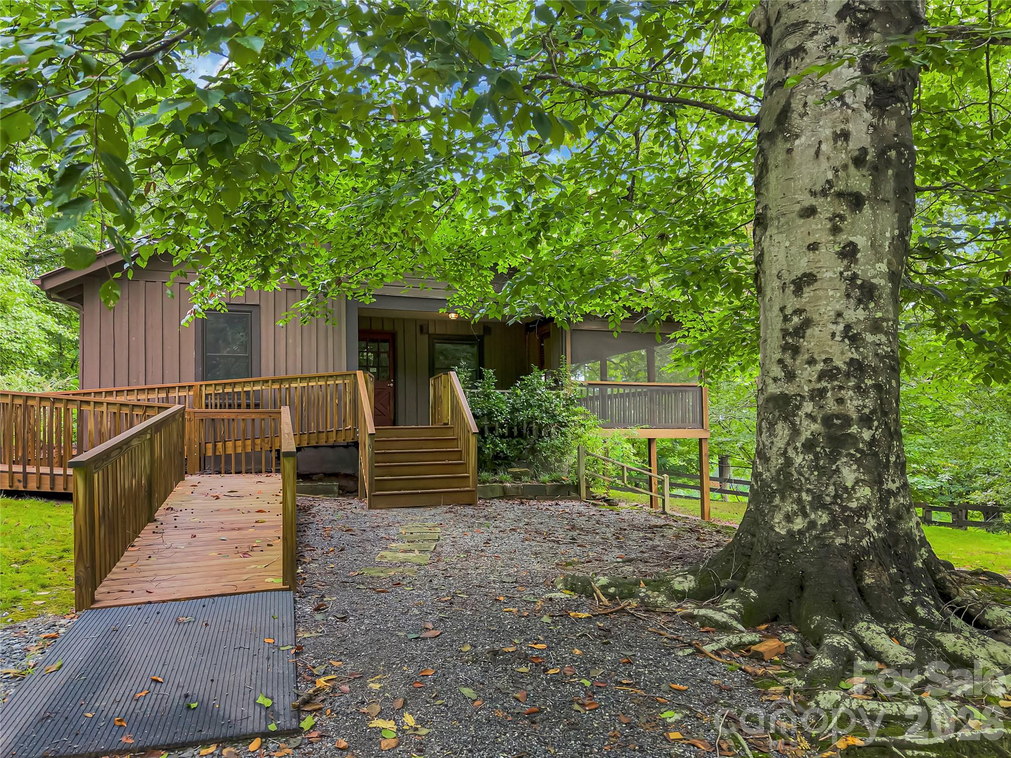 The MOST gorgeous old growth tree is a show piece at the front of the home. - 989 Fox Mountain Road, Columbus
