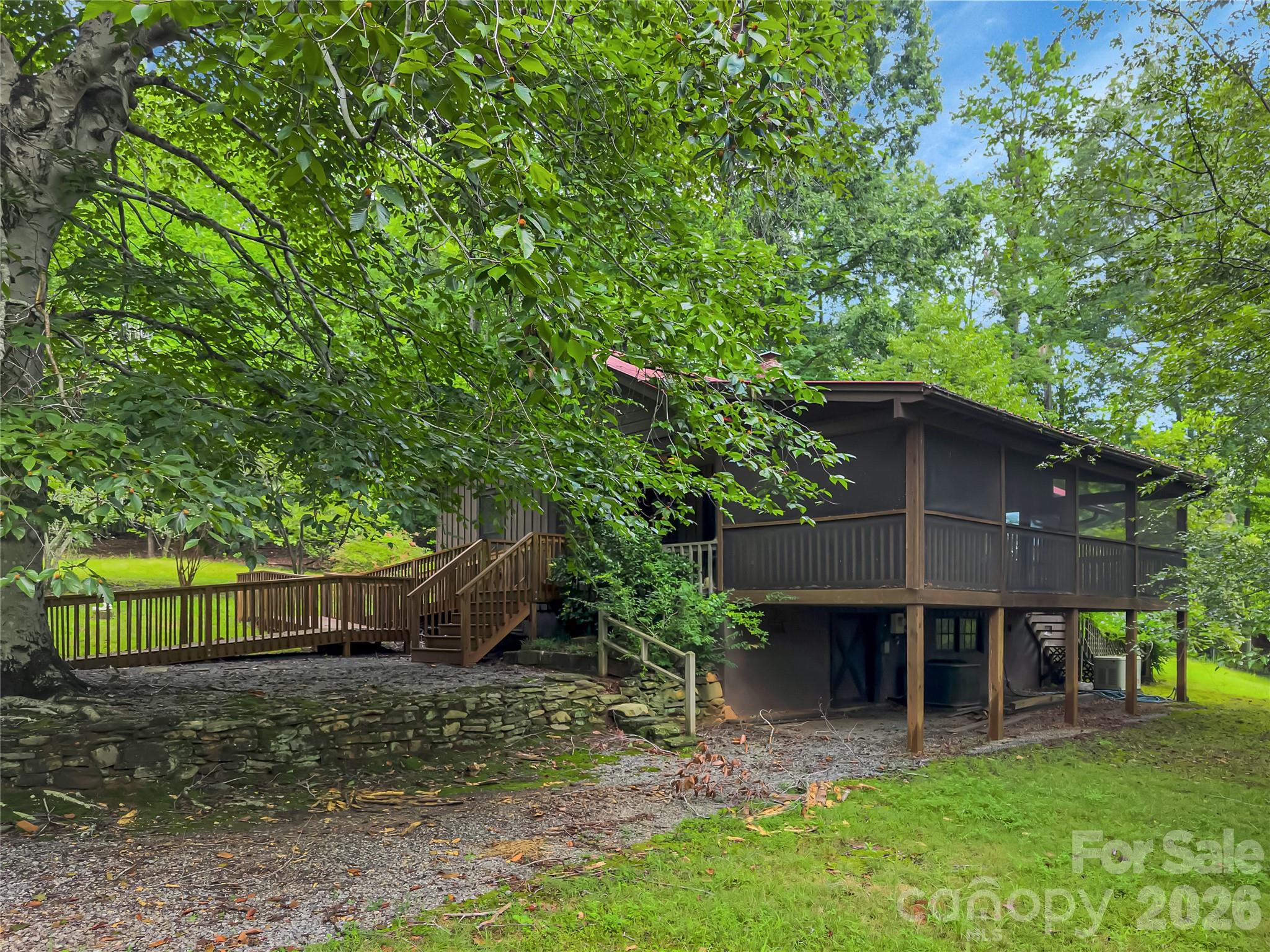 View of stone walls and side porch. - 989 Fox Mountain Road, Columbus