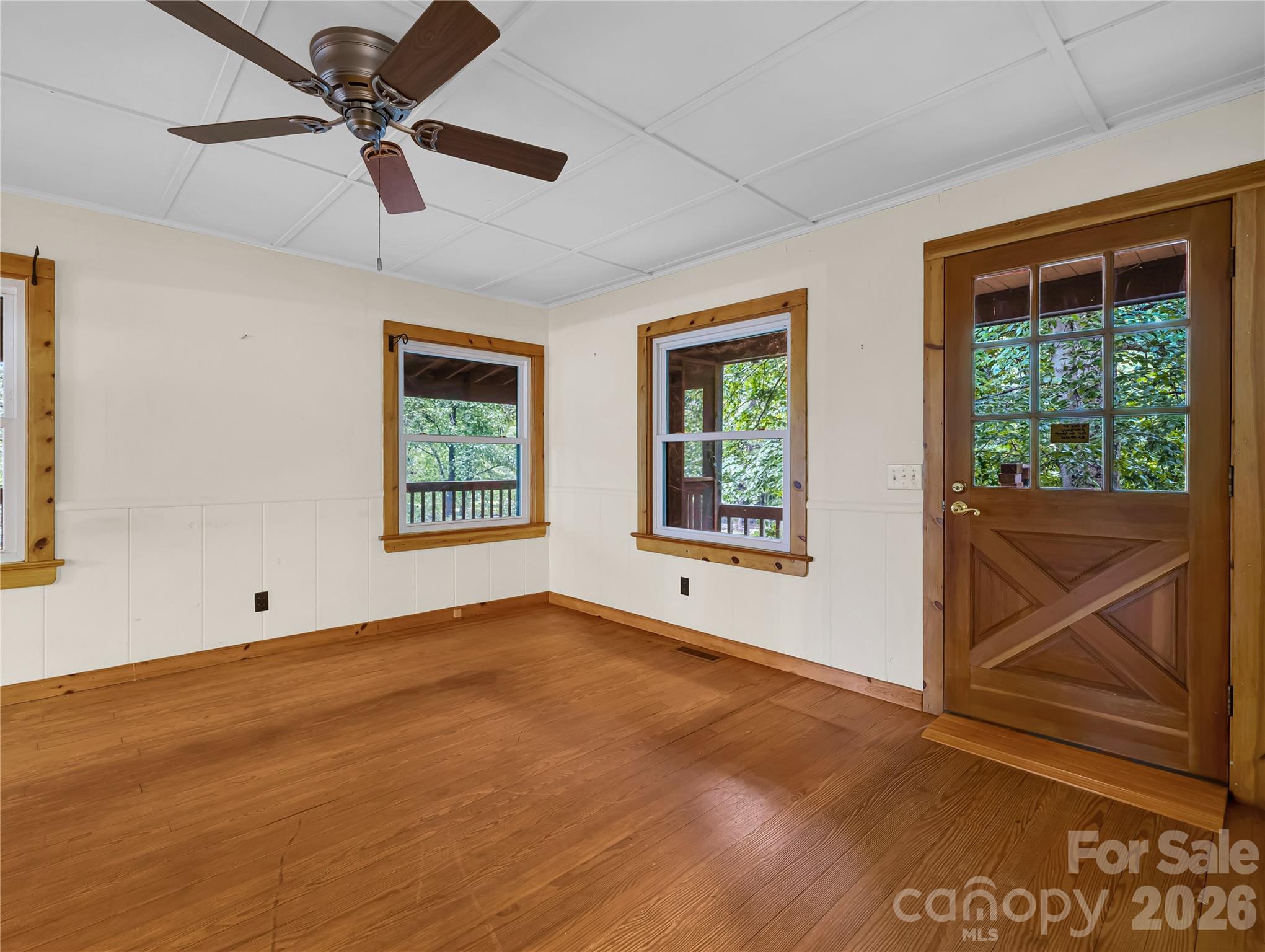 Living room, plenty of room on that left side wall for a full size couch. - 989 Fox Mountain Road, Columbus