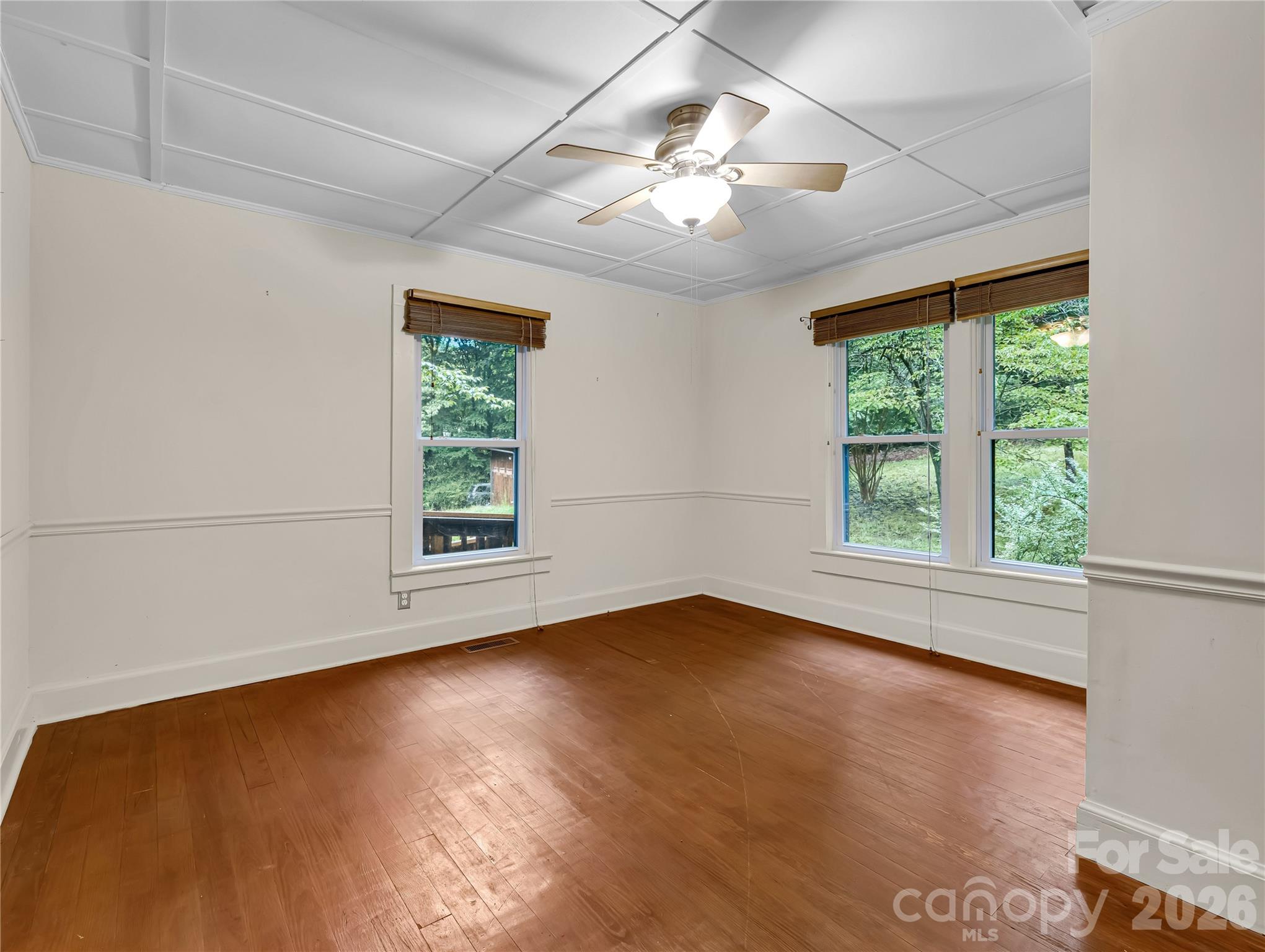 One of two bedrooms with wood floors. - 989 Fox Mountain Road, Columbus