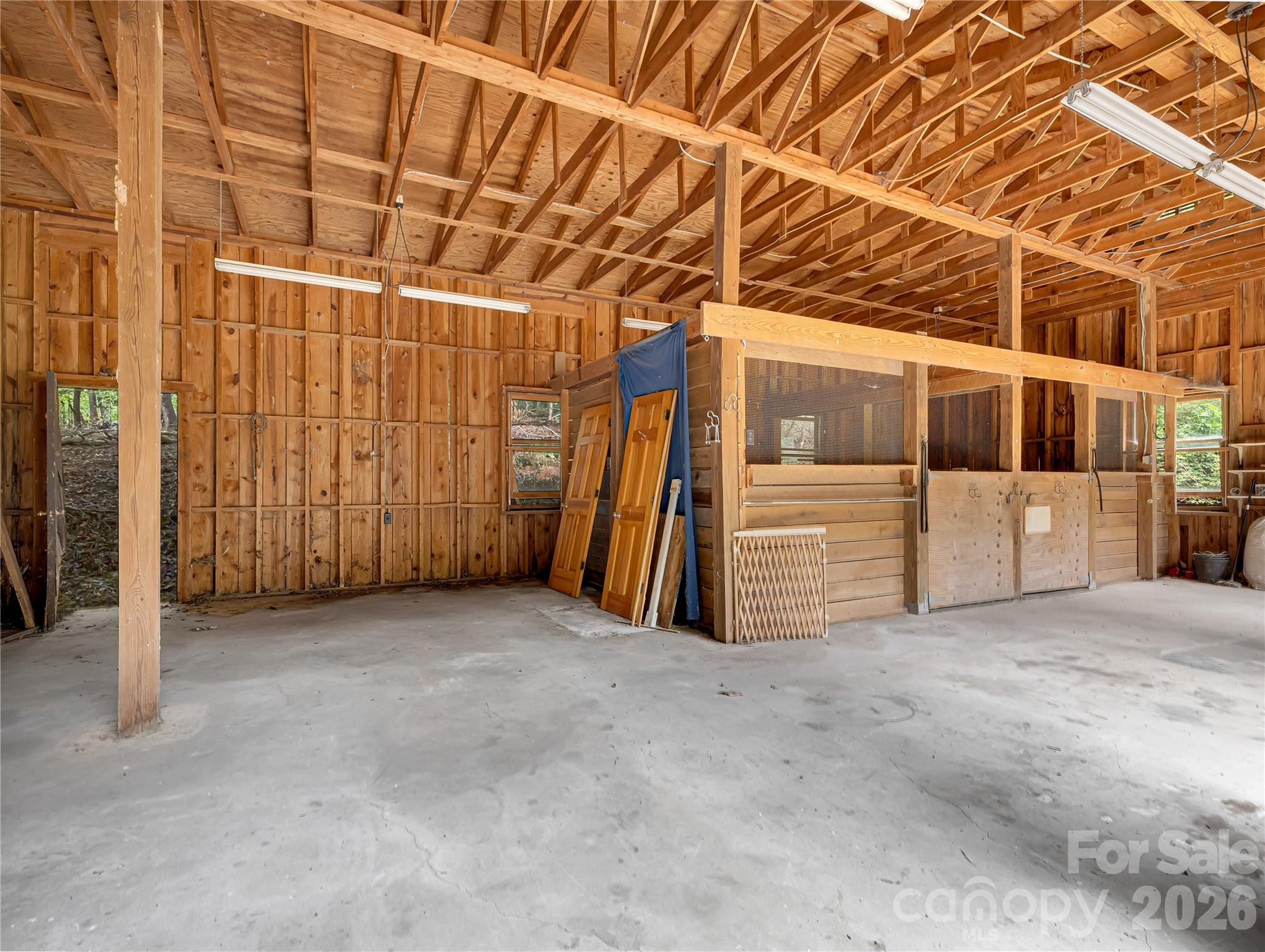 The barn building is just under 1000 square feet, two stalls are approximately 11'x11' each. - 989 Fox Mountain Road, Columbus