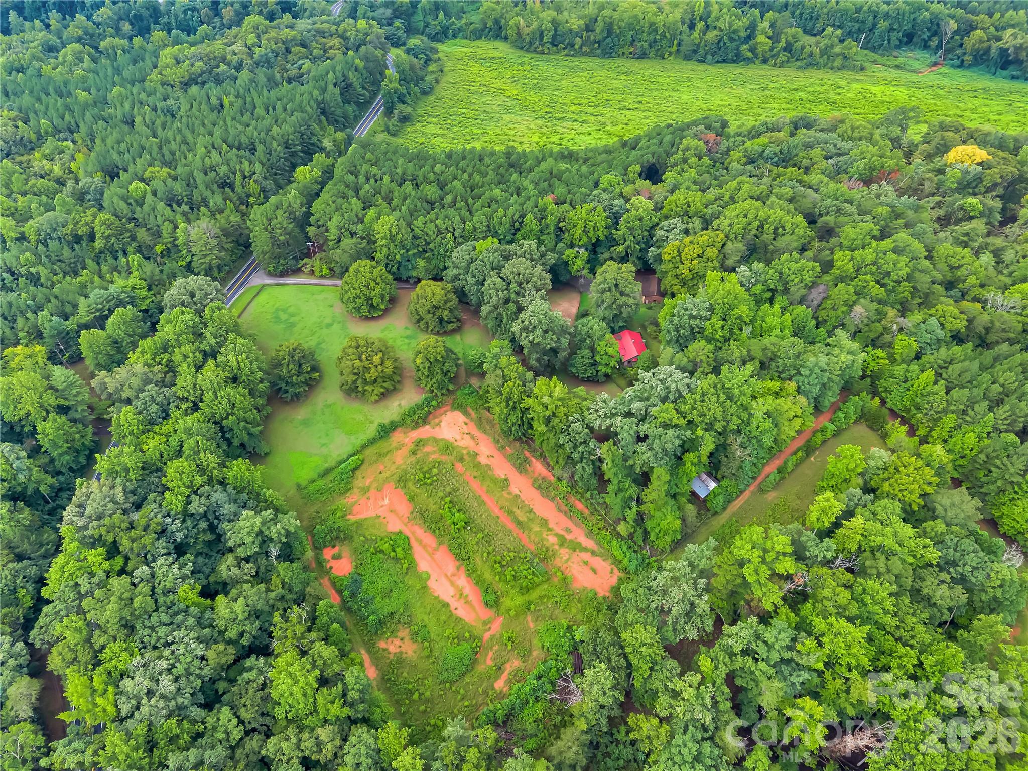 The area with exposed clay is not part of this horse farm. - 989 Fox Mountain Road, Columbus