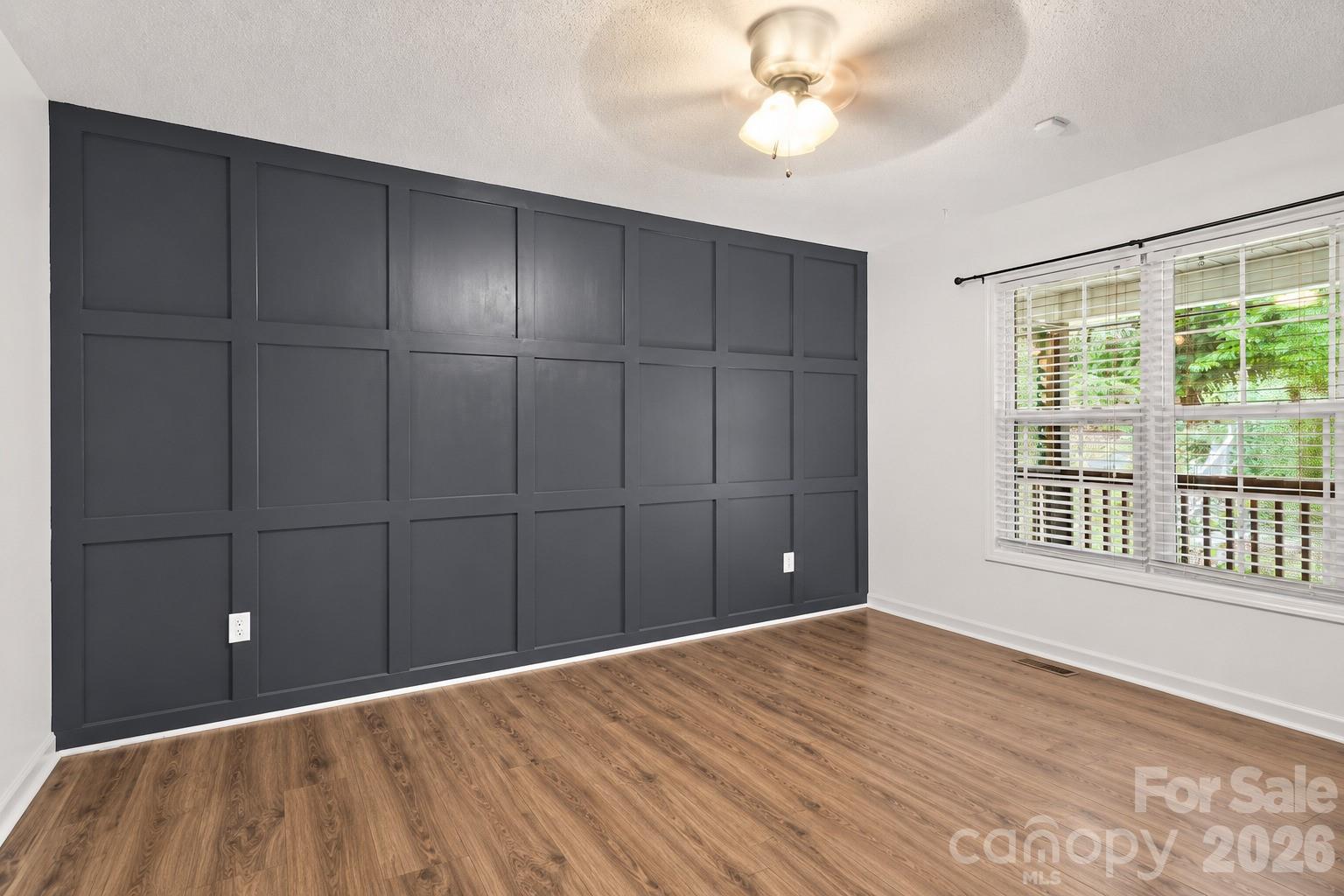 virtual staging primary bedroom - 28 Grove Garden Avenue, Candler